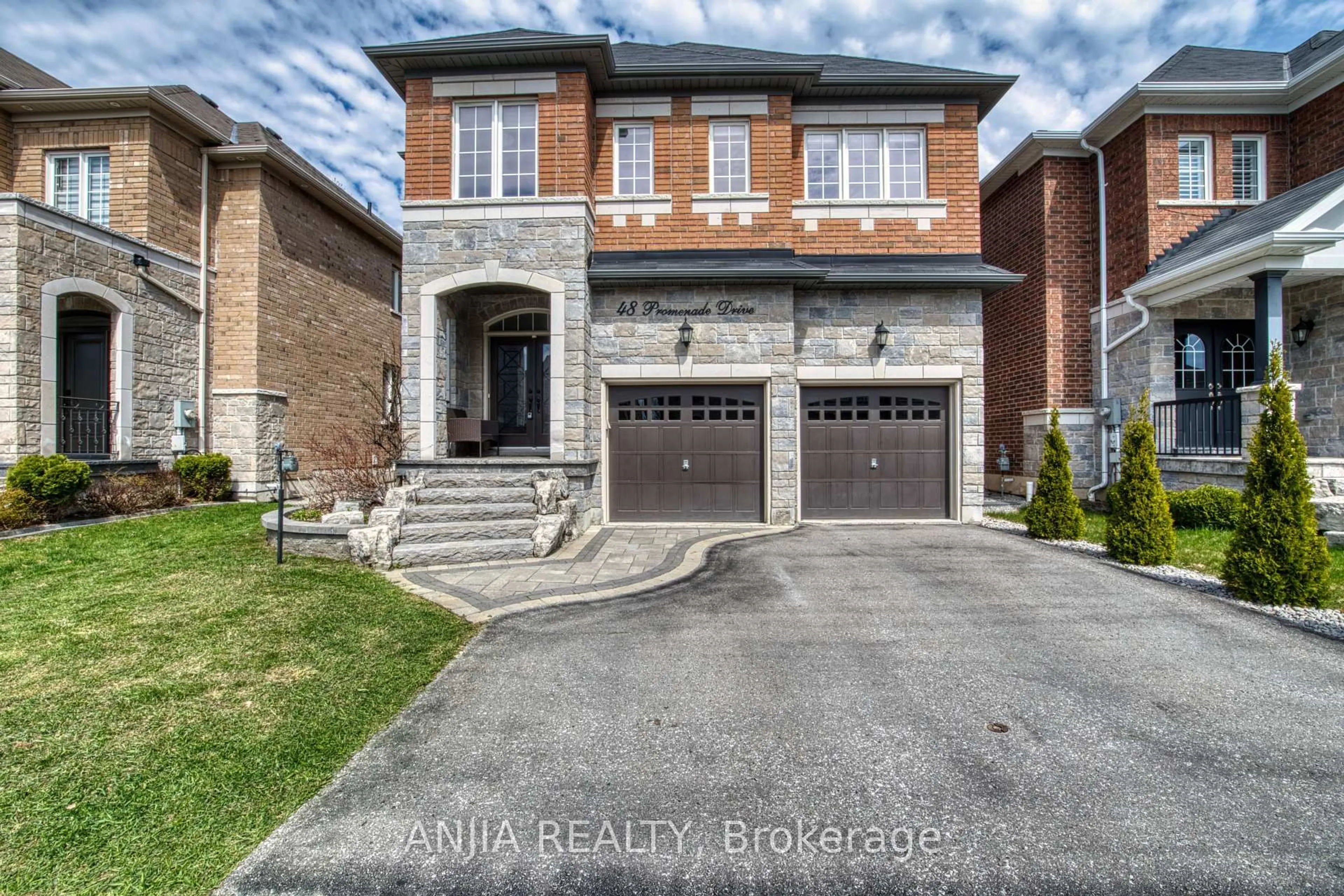 Home with brick exterior material, street for 48 Promenade Dr, Whitby Ontario L1R 0L4