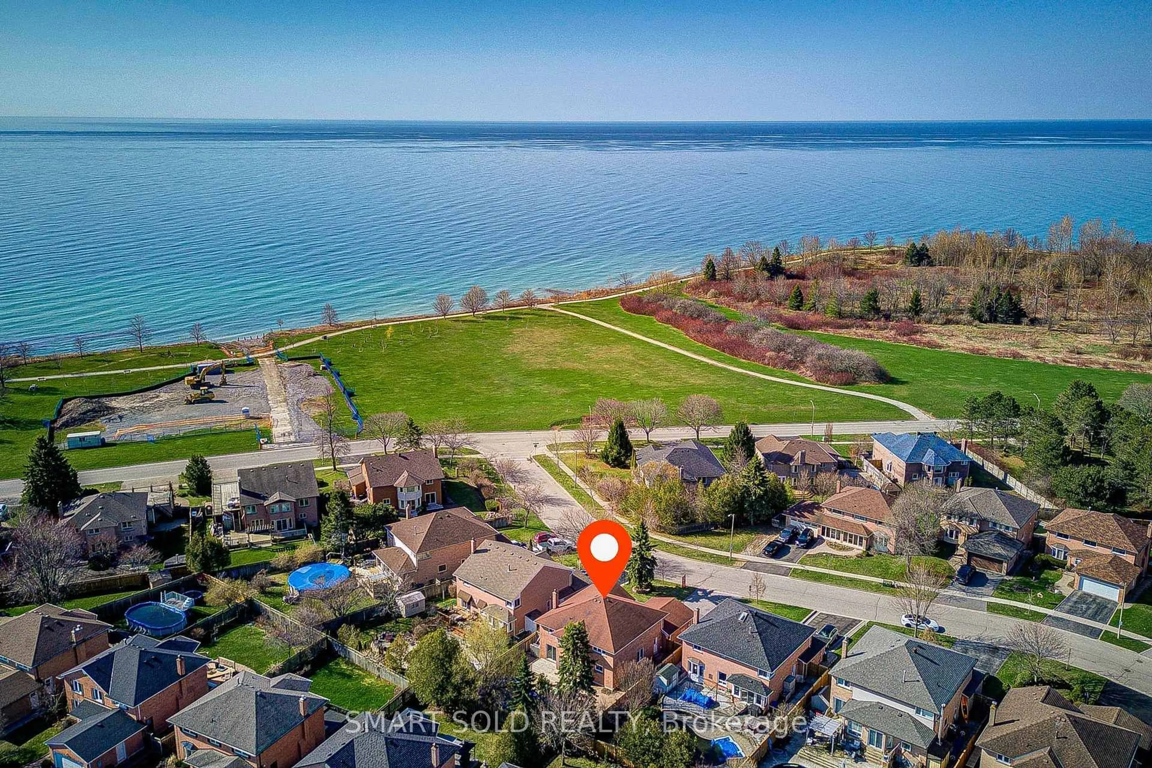 A pic from outside/outdoor area/front of a property/back of a property/a pic from drone, water/lake/river/ocean view for 33 Love Cres, Ajax Ontario L1S 4T3