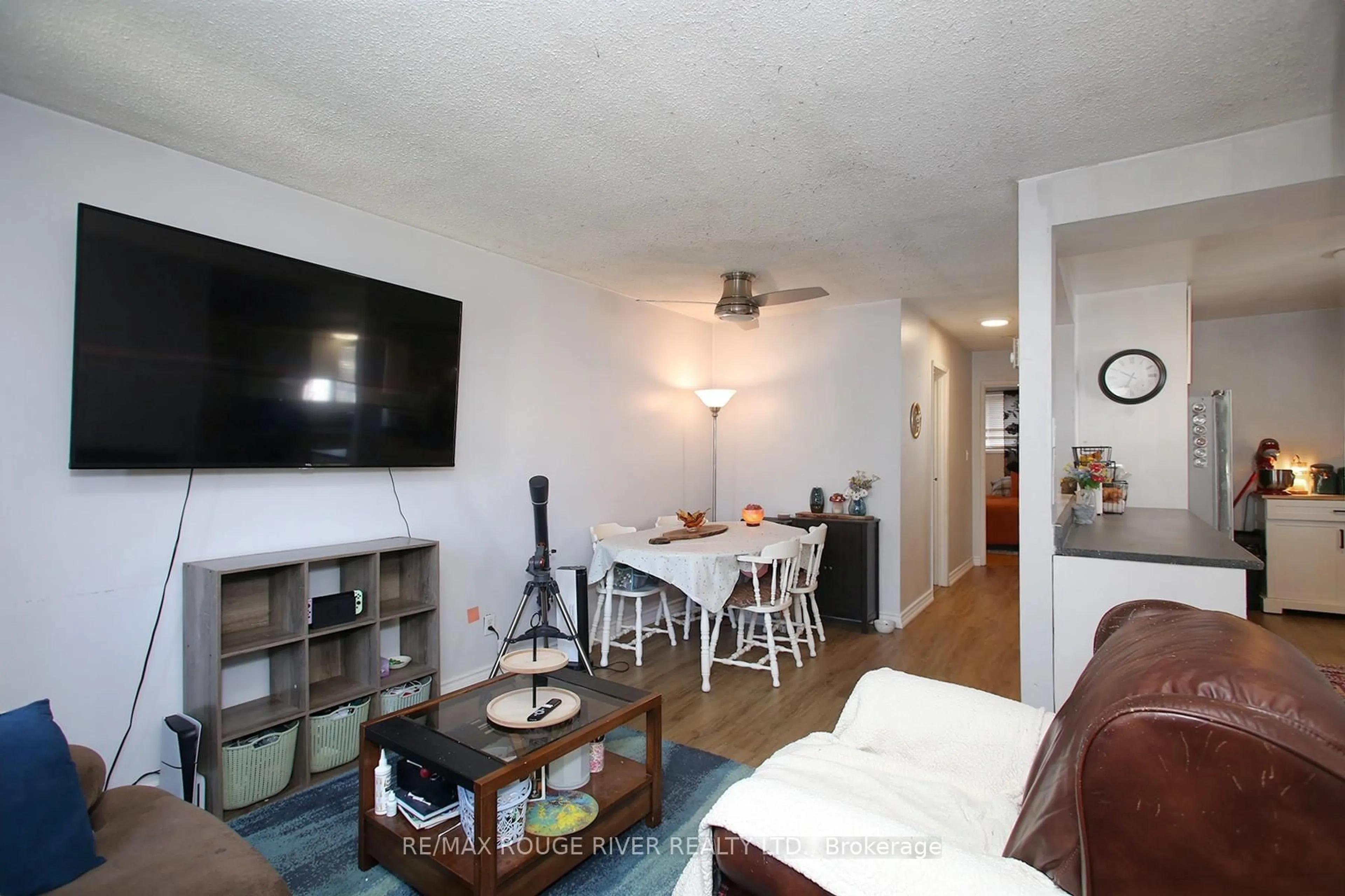 Living room with furniture, wood/laminate floor for 1308 Fundy Crt, Oshawa Ontario L1J 3N4