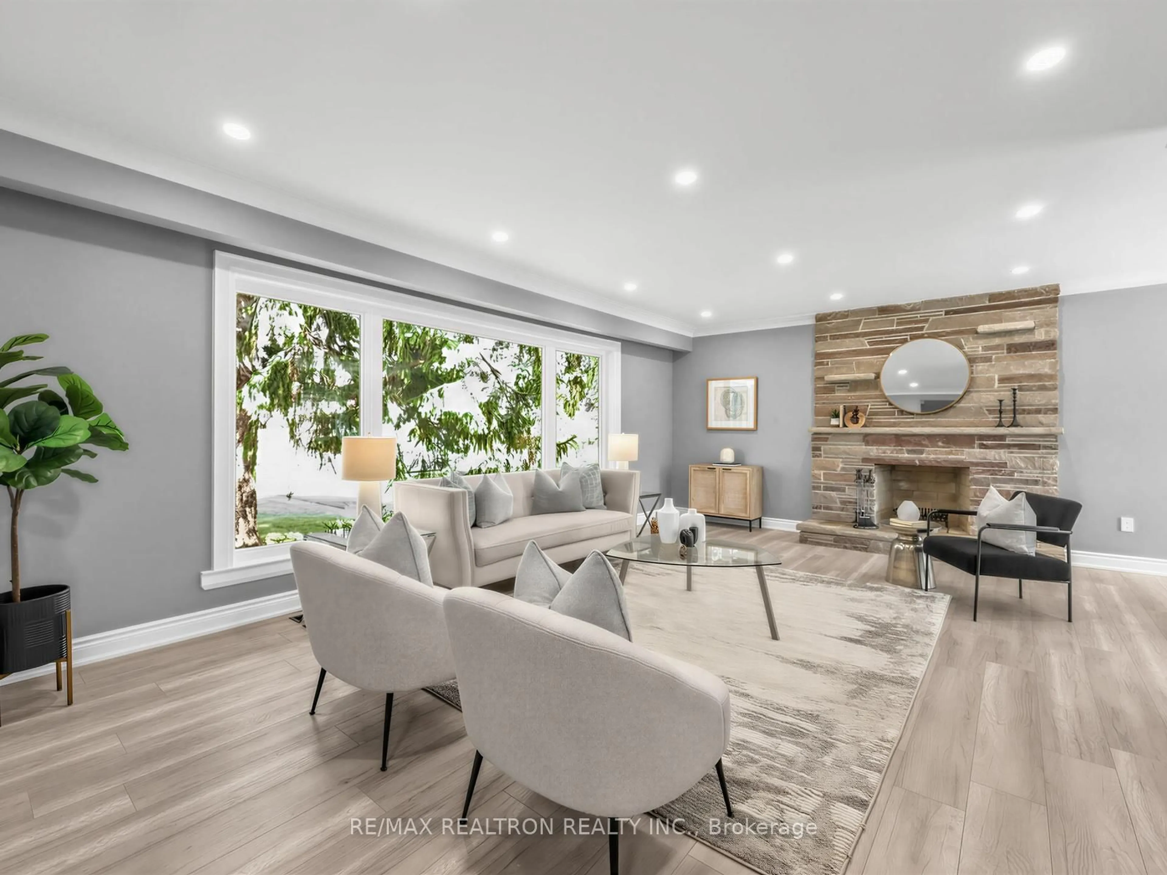 Living room with furniture, wood/laminate floor for 7 White Ave, Toronto Ontario M1C 1P1