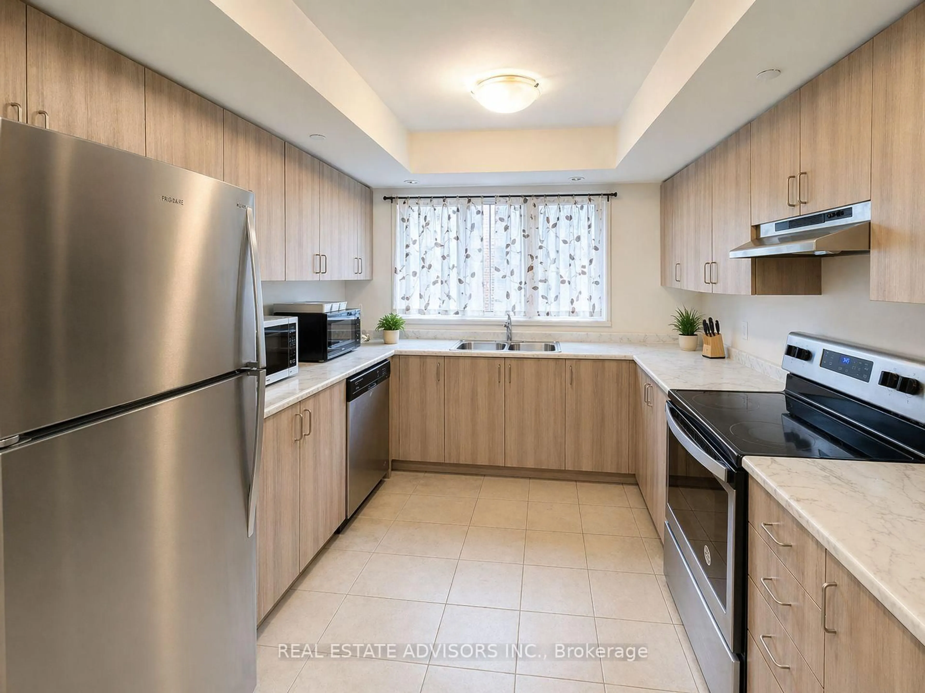 Standard kitchen, ceramic/tile floor for 2696 Deputy Minister Path #169, Oshawa Ontario L1H 7K4