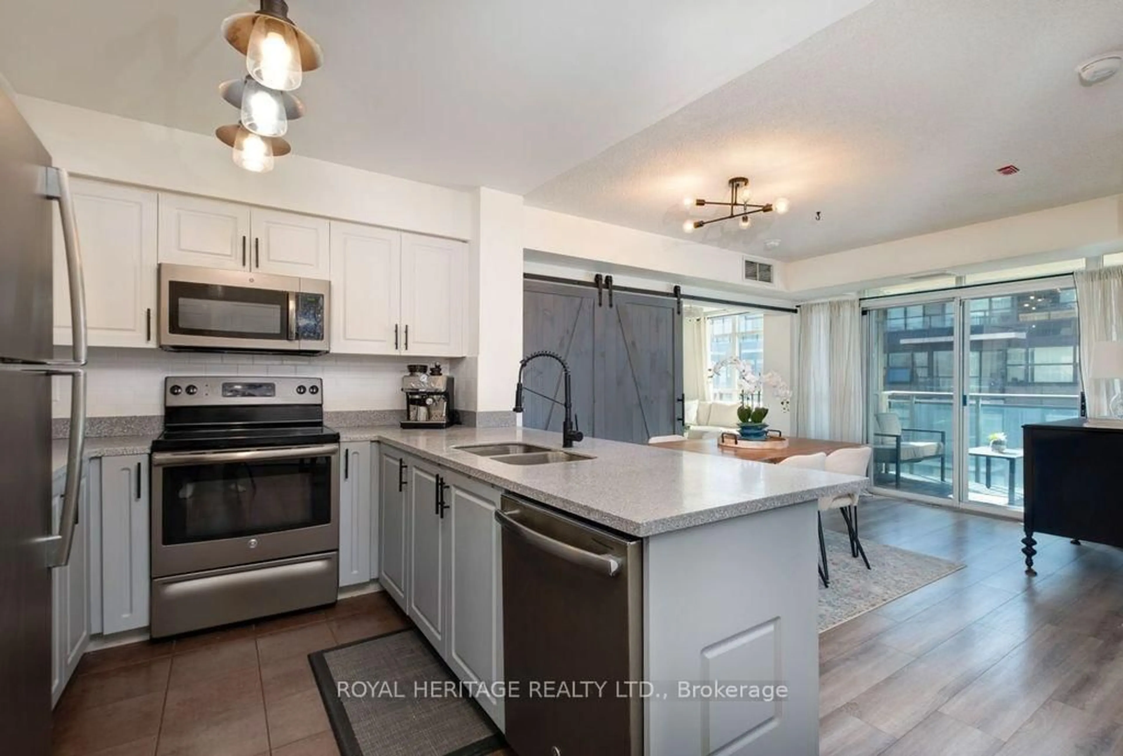 Open concept kitchen, ceramic/tile floor for 1600 Charles St St #413, Whitby Ontario L1N 0G4