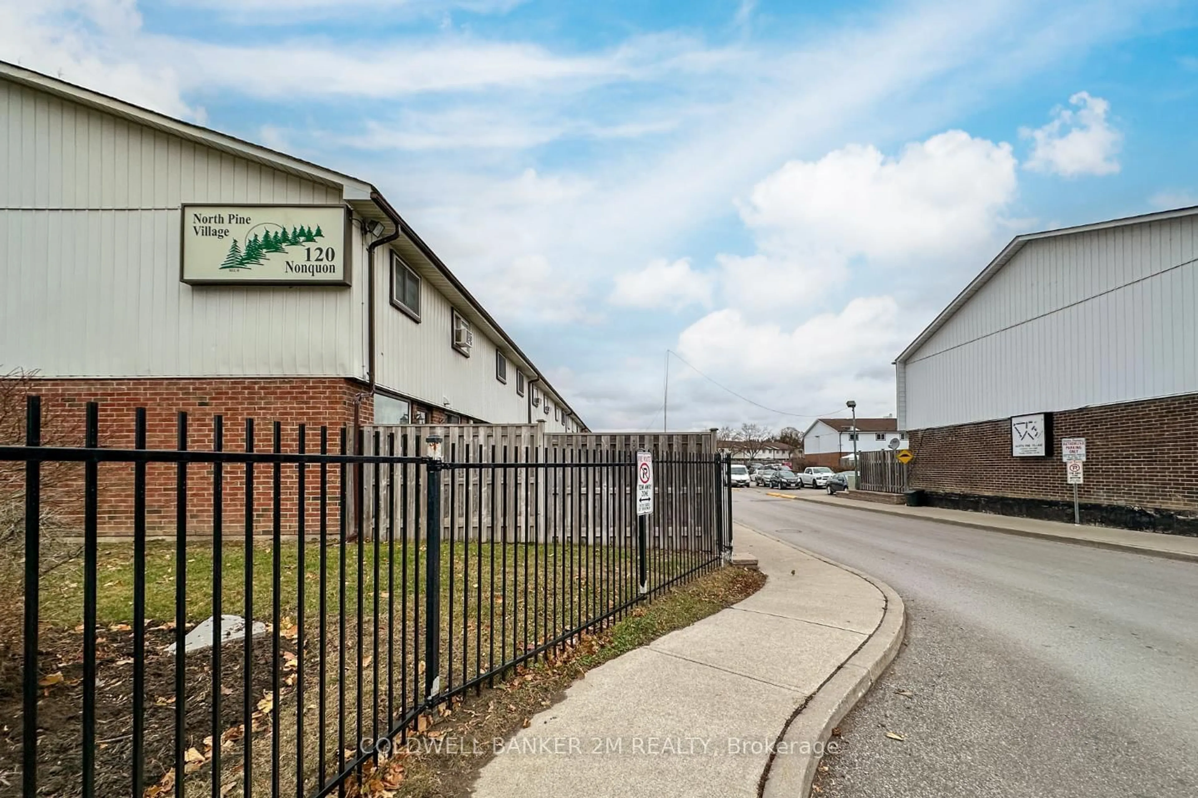 A pic from outside/outdoor area/front of a property/back of a property/a pic from drone, street for 120 Nonquon Rd #100, Oshawa Ontario L1G 7E6