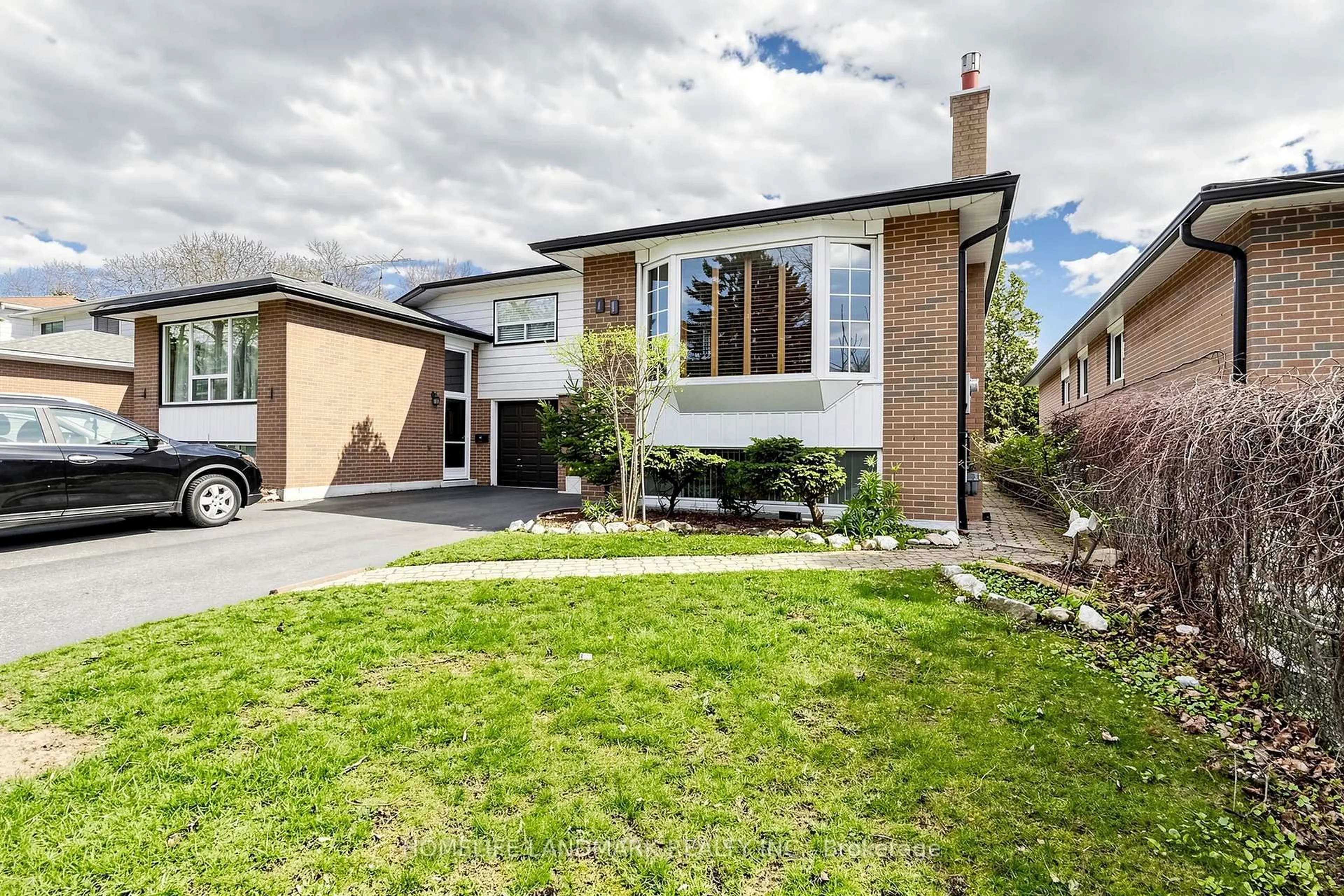 Home with brick exterior material, street for 49 Glenstroke Dr, Toronto Ontario M1S 3A1