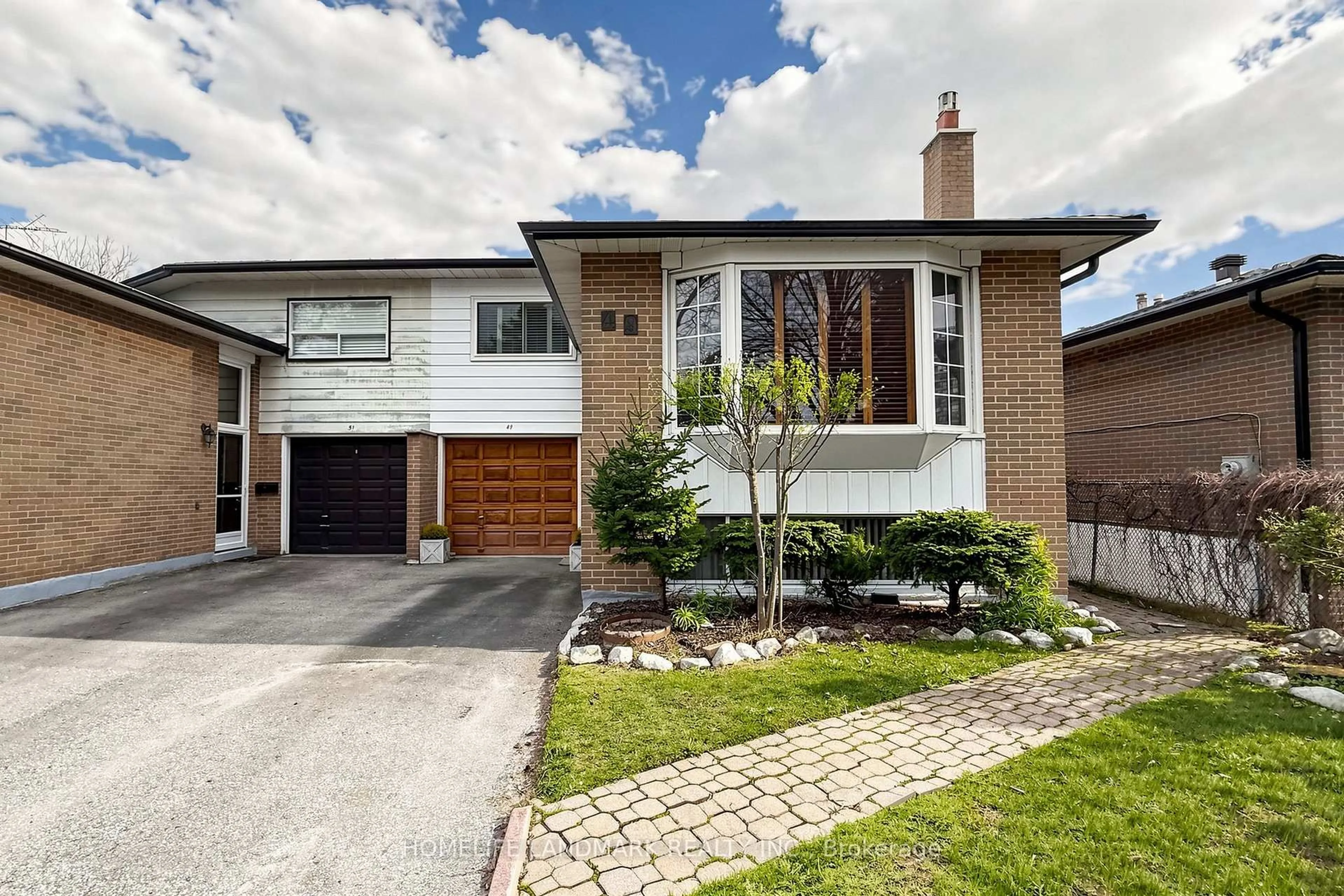 Home with brick exterior material, street for 49 Glenstroke Dr, Toronto Ontario M1S 3A1