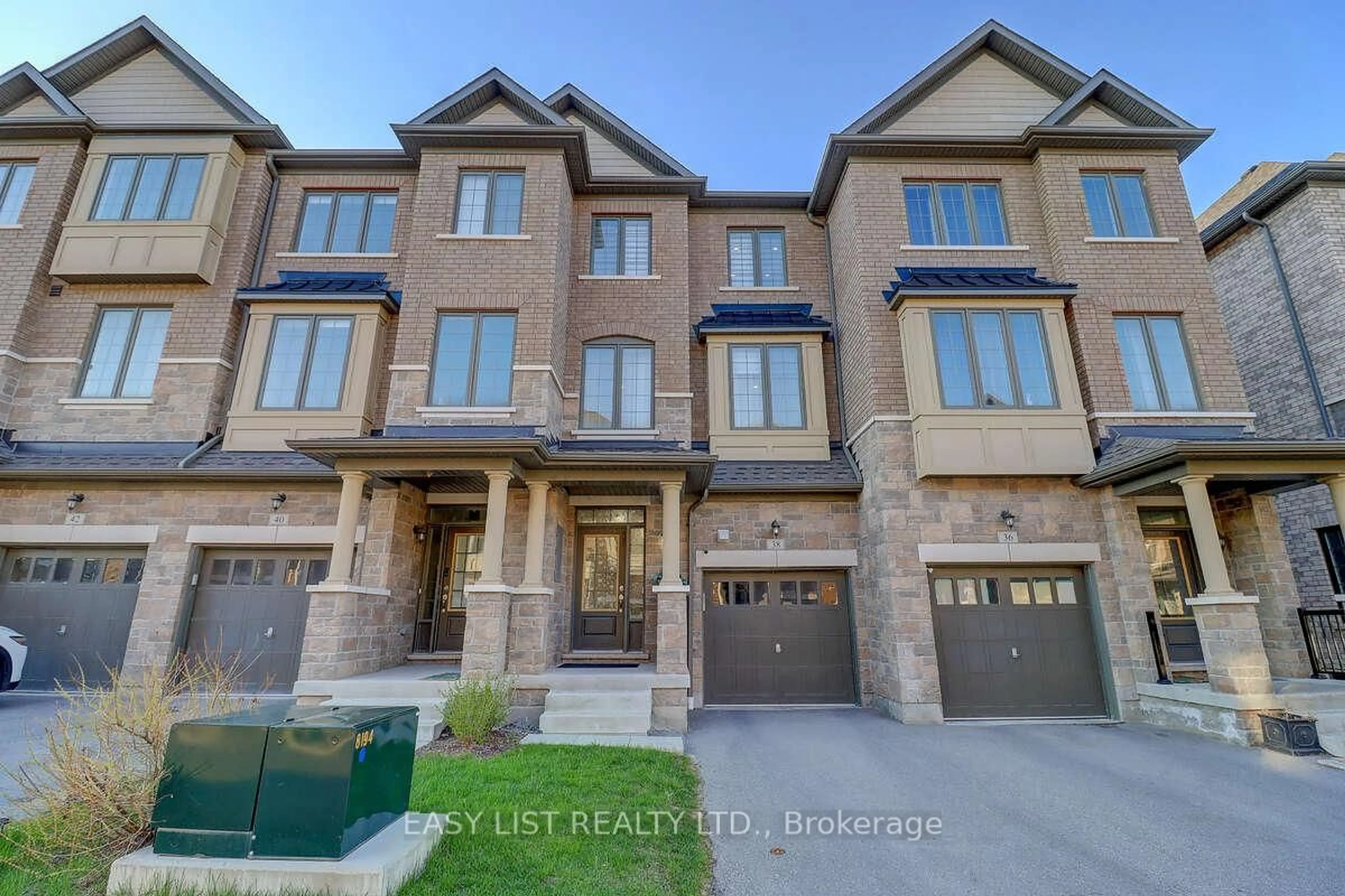 Home with brick exterior material, street for 38 Hallmark Way, Whitby Ontario L1P 0K2