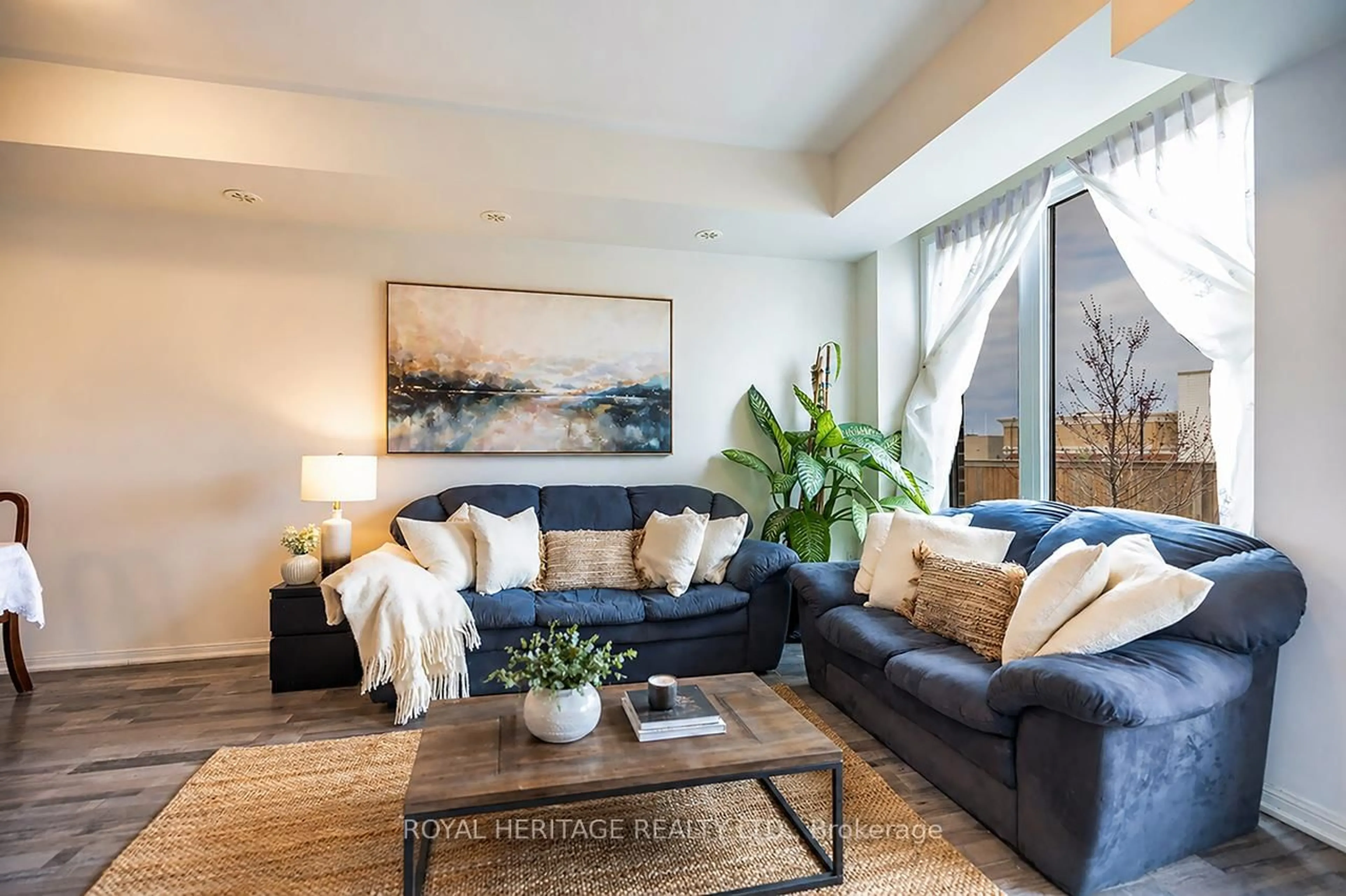Living room with furniture, unknown for 1460 Whites Rd #413, Pickering Ontario L1V 0E8