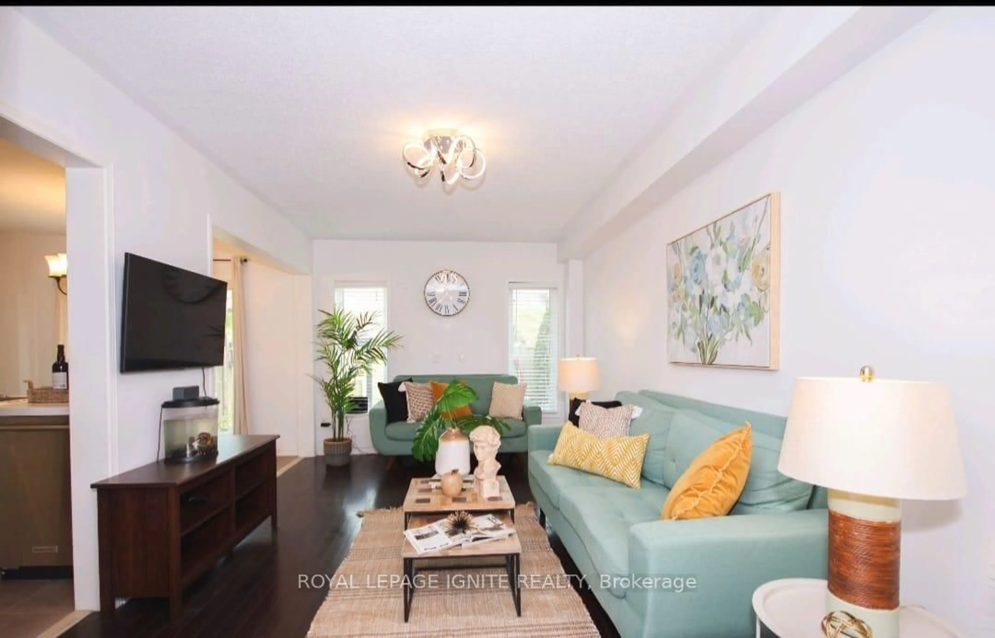 Living room with furniture, wood/laminate floor for 66 Westray Cres, Ajax Ontario L1Z 0B3