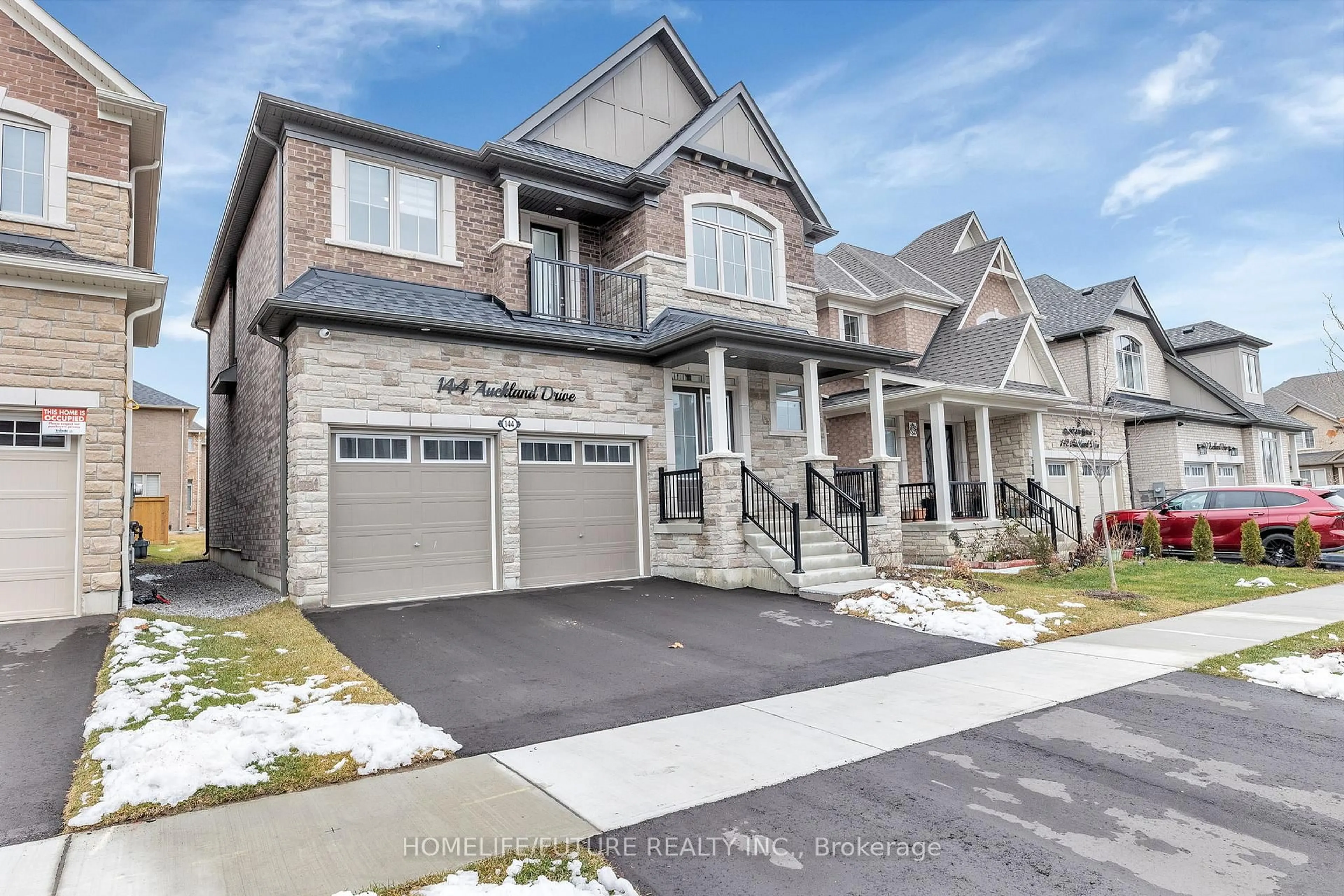 Home with brick exterior material, street for 144 Auckland Dr, Whitby Ontario L1P 0J2