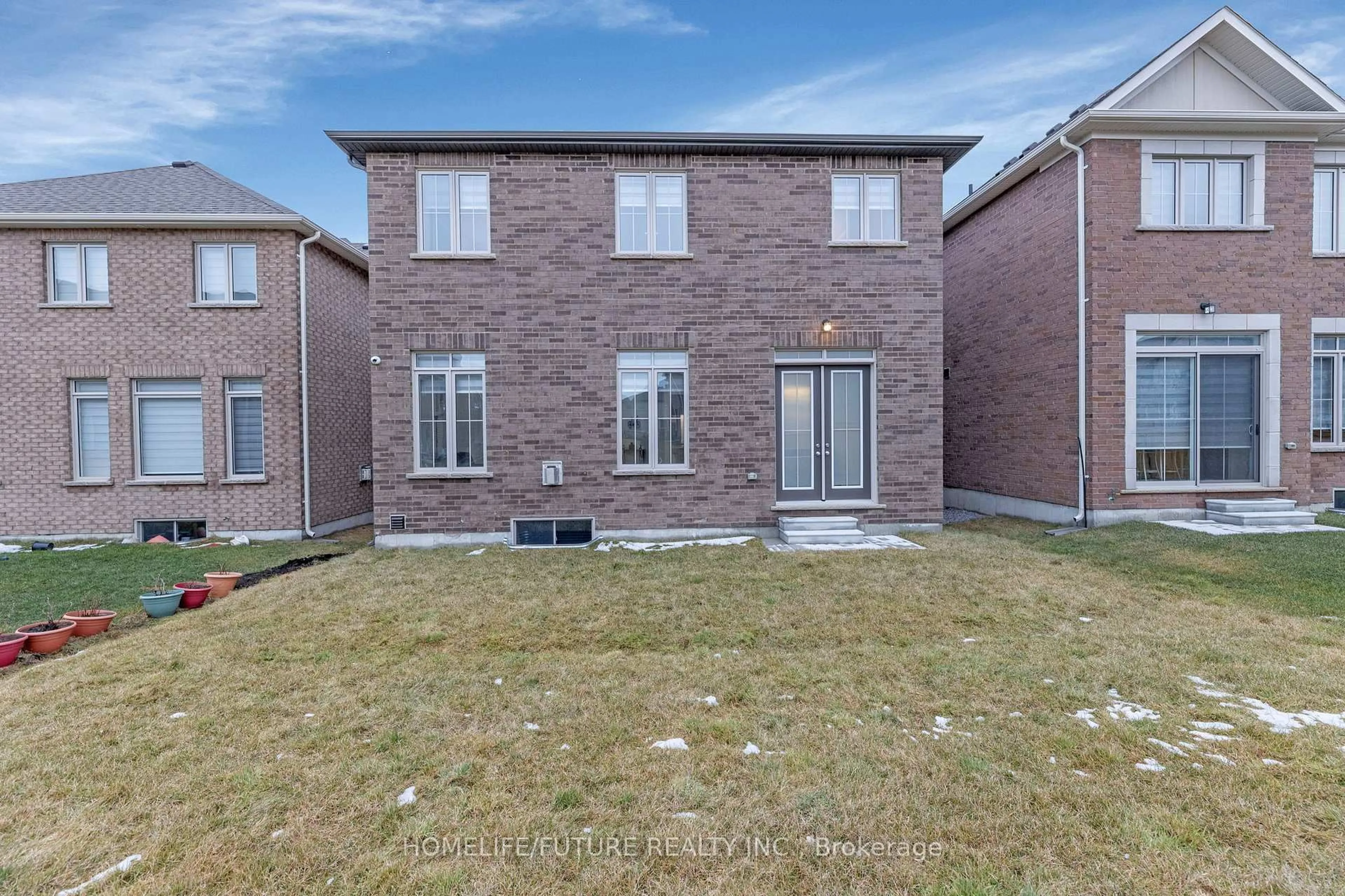Home with brick exterior material, street for 144 Auckland Dr, Whitby Ontario L1P 0J2