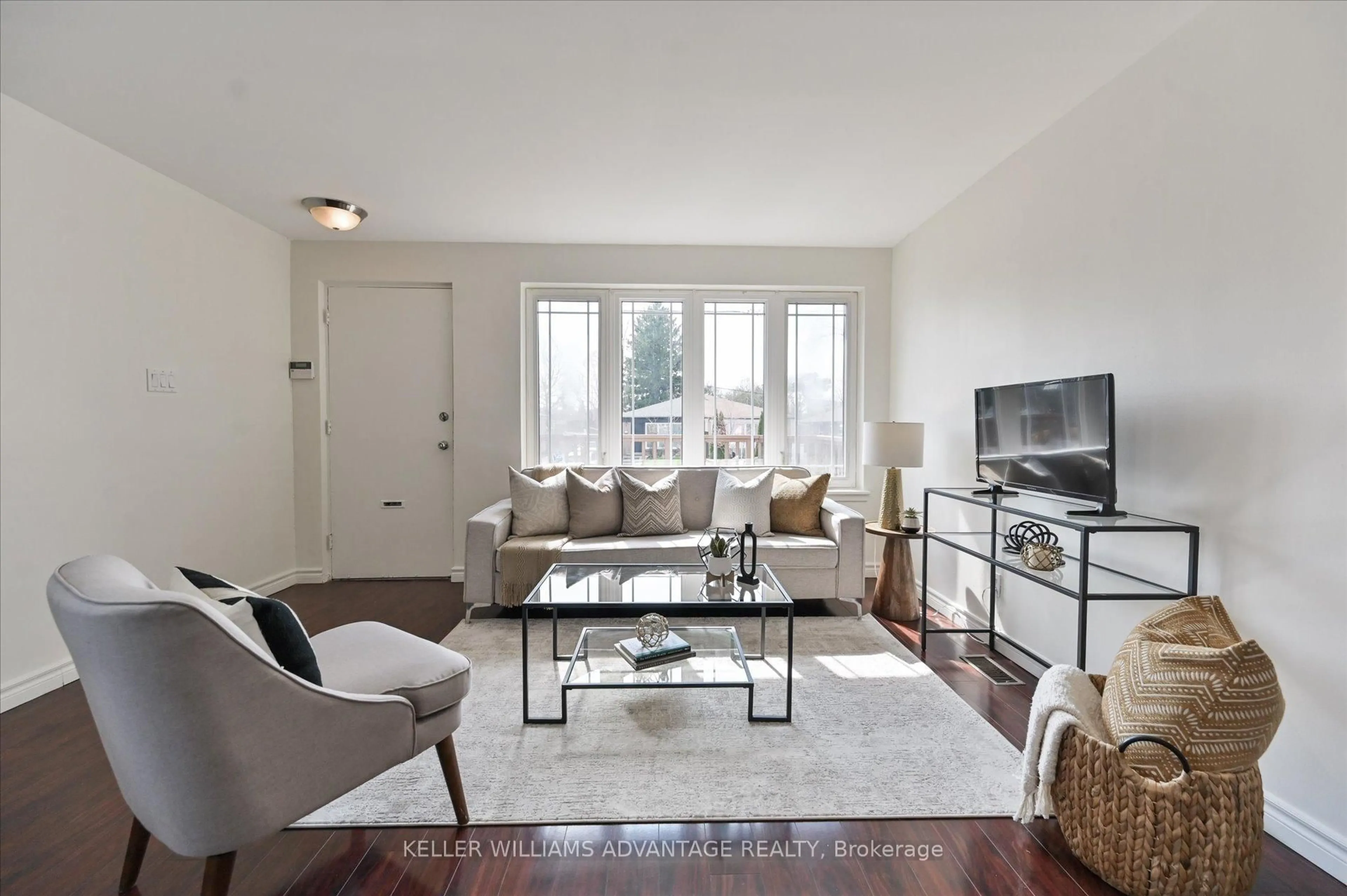 Living room with furniture, unknown for 201 Linden Ave, Toronto Ontario M1K 3J1