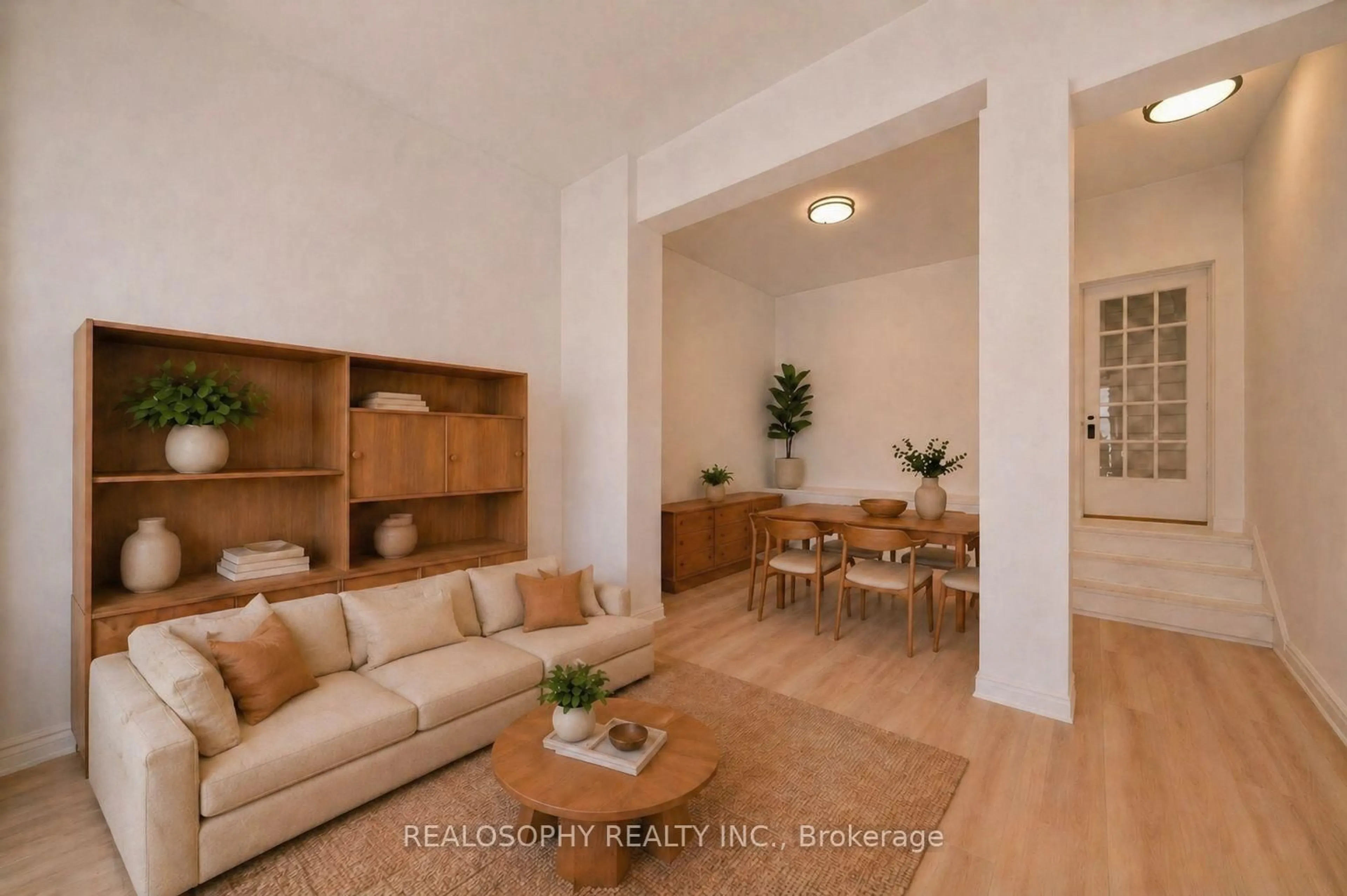 Living room with furniture, wood/laminate floor for 865 Pape Ave, Toronto Ontario M4K 3T7