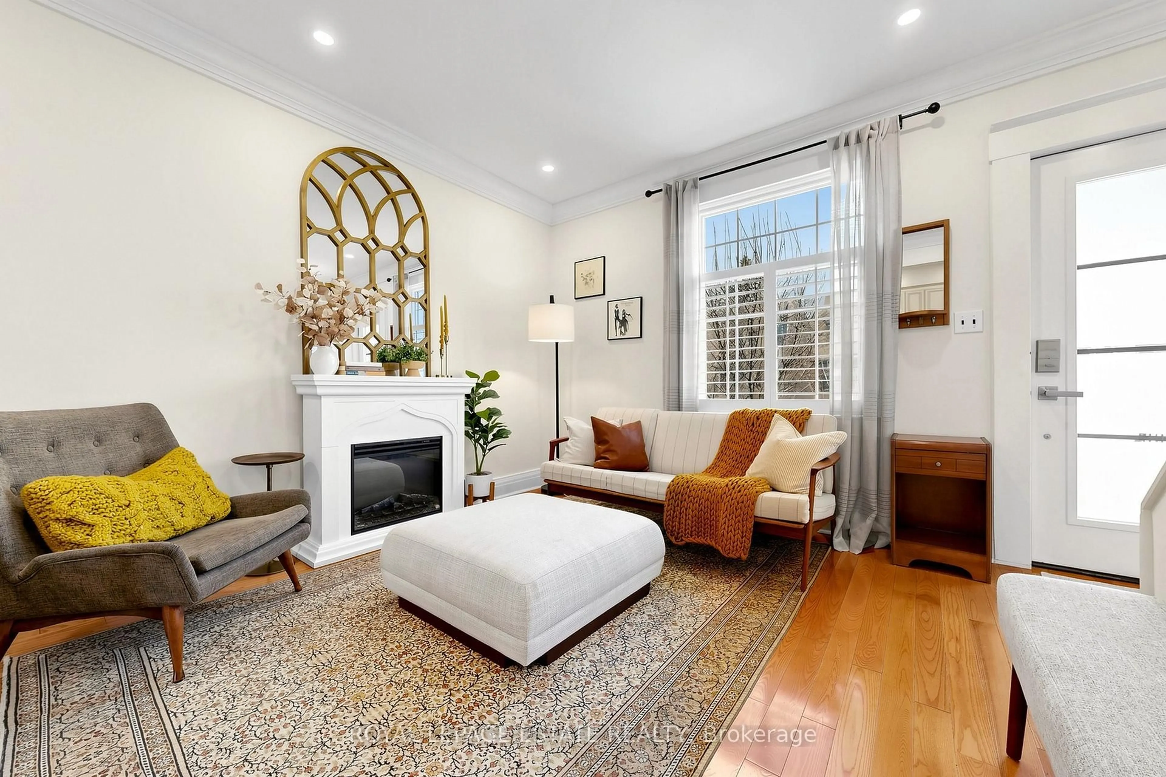 Living room with furniture, unknown for 823 Sammon Ave, Toronto Ontario M4C 2E7