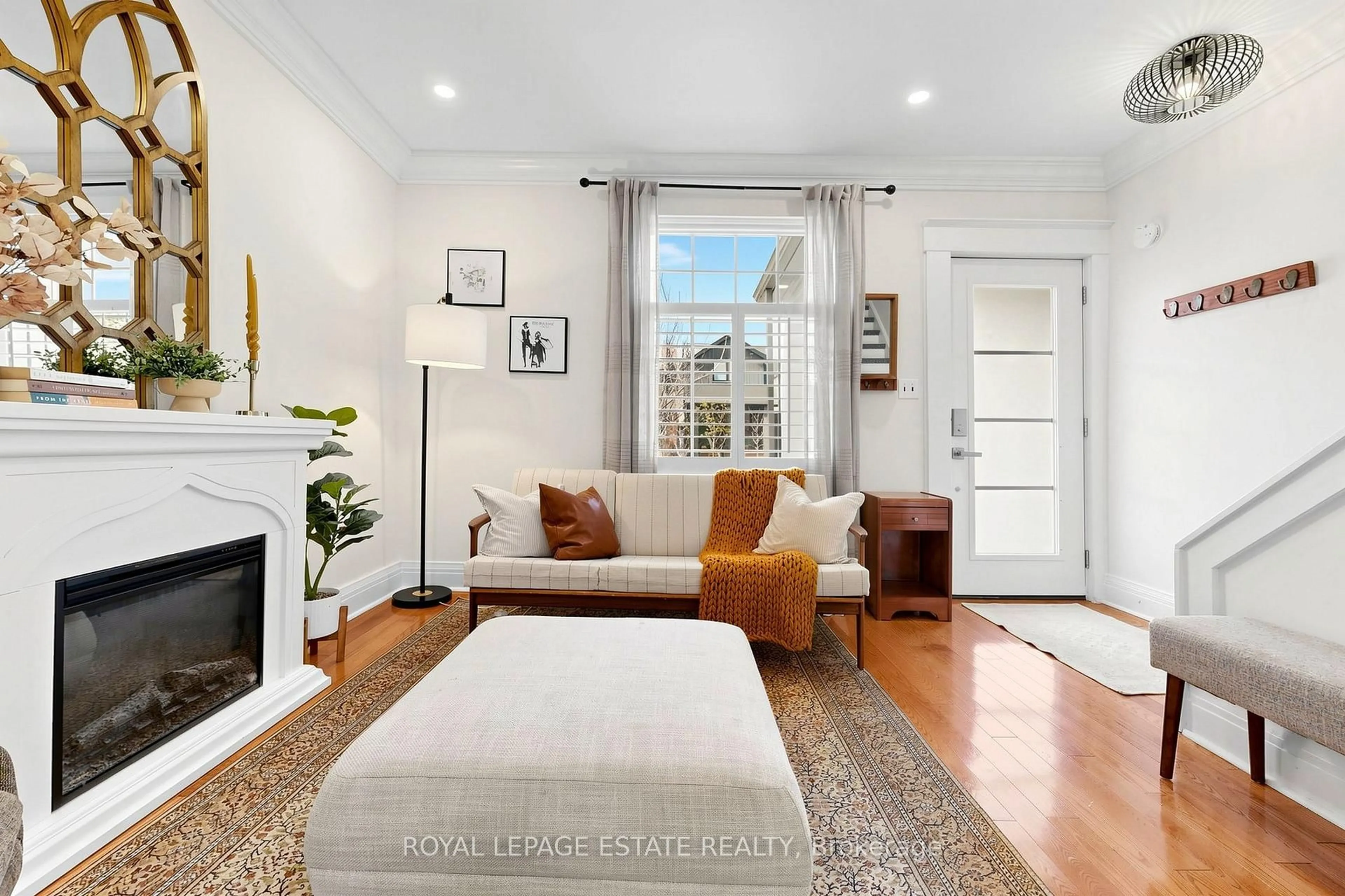 Living room with furniture, unknown for 823 Sammon Ave, Toronto Ontario M4C 2E7