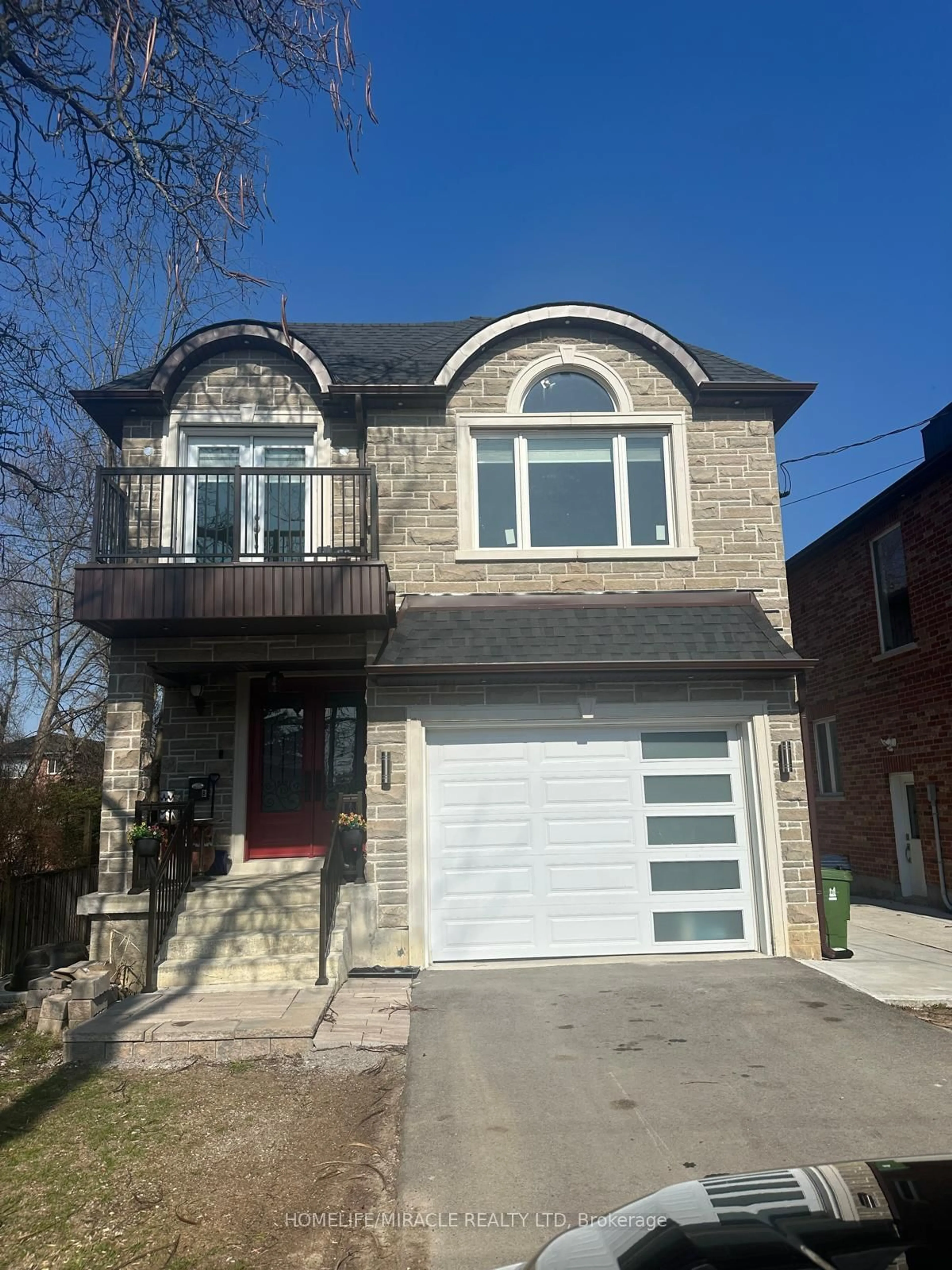 Home with brick exterior material, street for 69B Homestead Rd, Toronto Ontario M1E 3S1