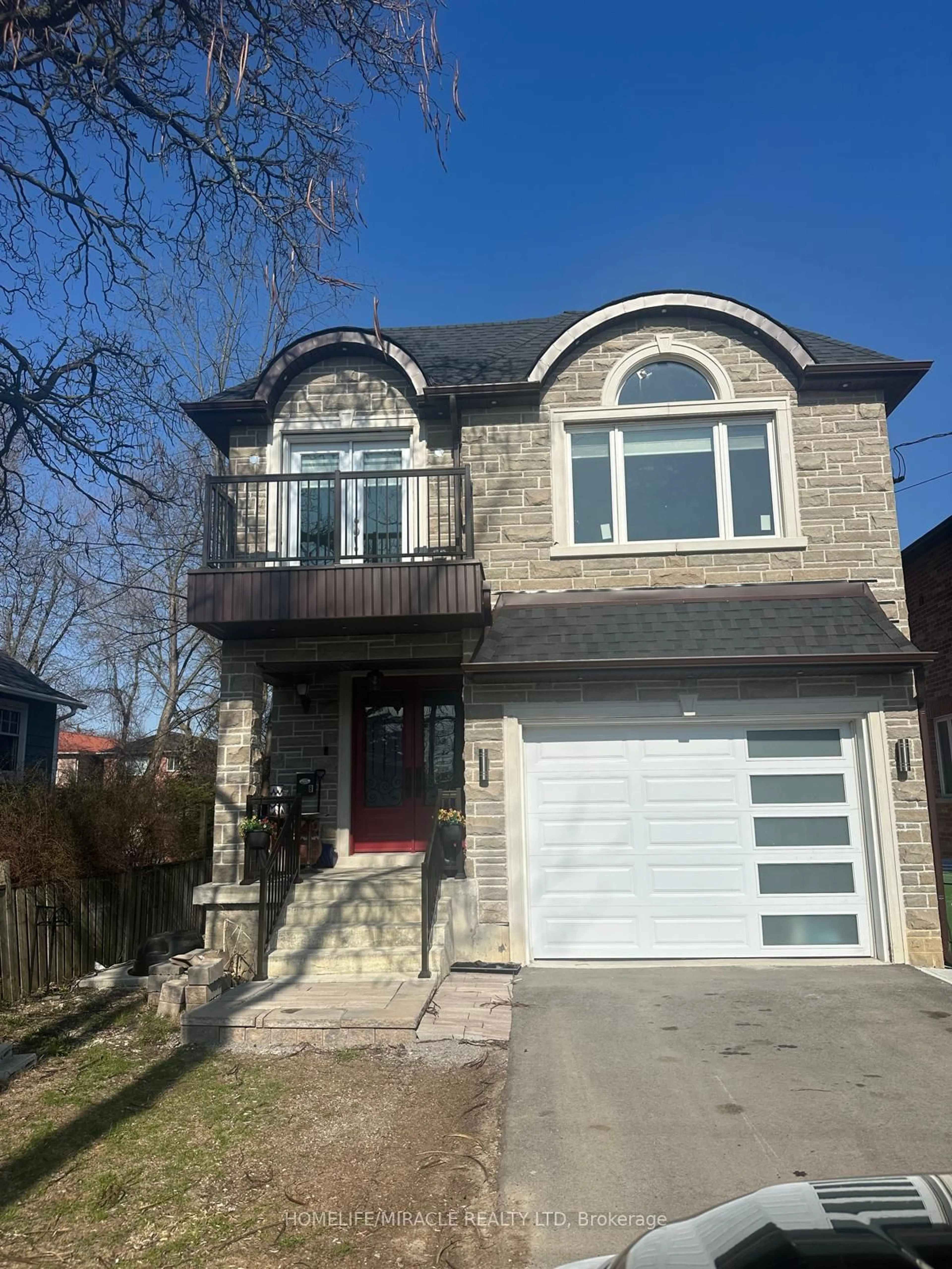 Home with brick exterior material, street for 69B Homestead Rd, Toronto Ontario M1E 3S1
