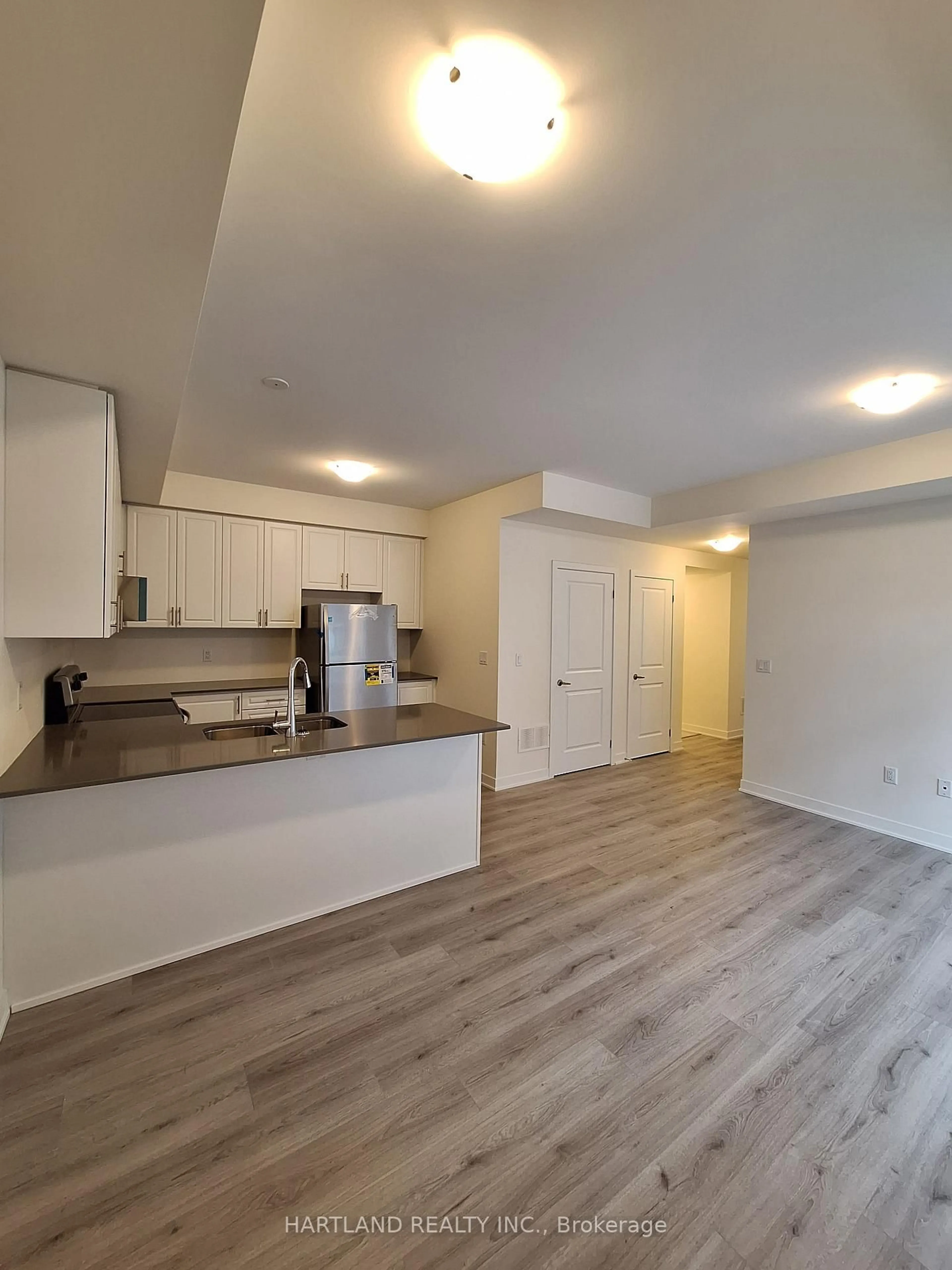 Open concept kitchen, wood/laminate floor for 1695 Dersan St #1303, Pickering Ontario L1X 0S9