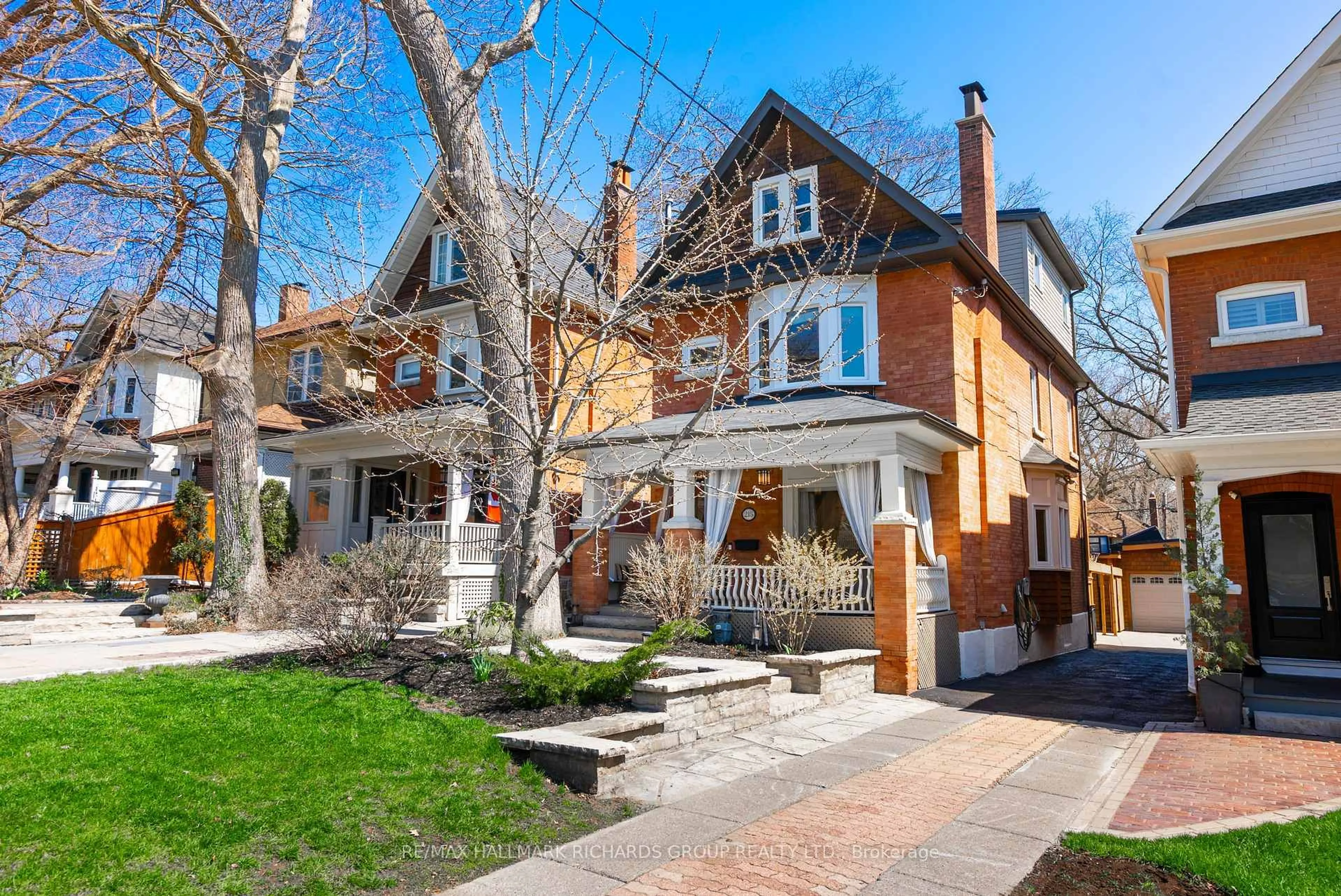 Home with brick exterior material, street for 215 Wineva Ave, Toronto Ontario M4E 2T5