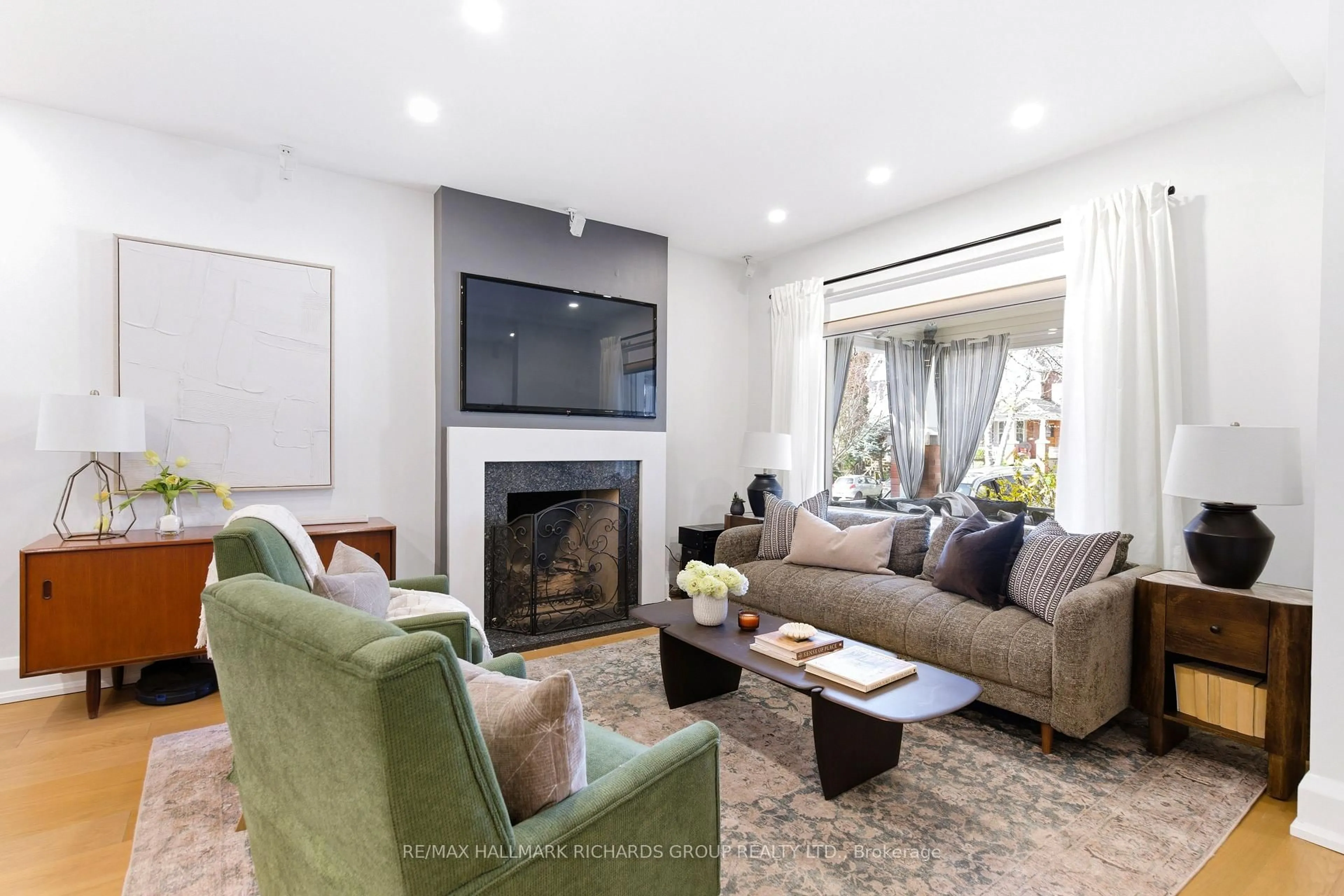 Living room with furniture, unknown for 215 Wineva Ave, Toronto Ontario M4E 2T5