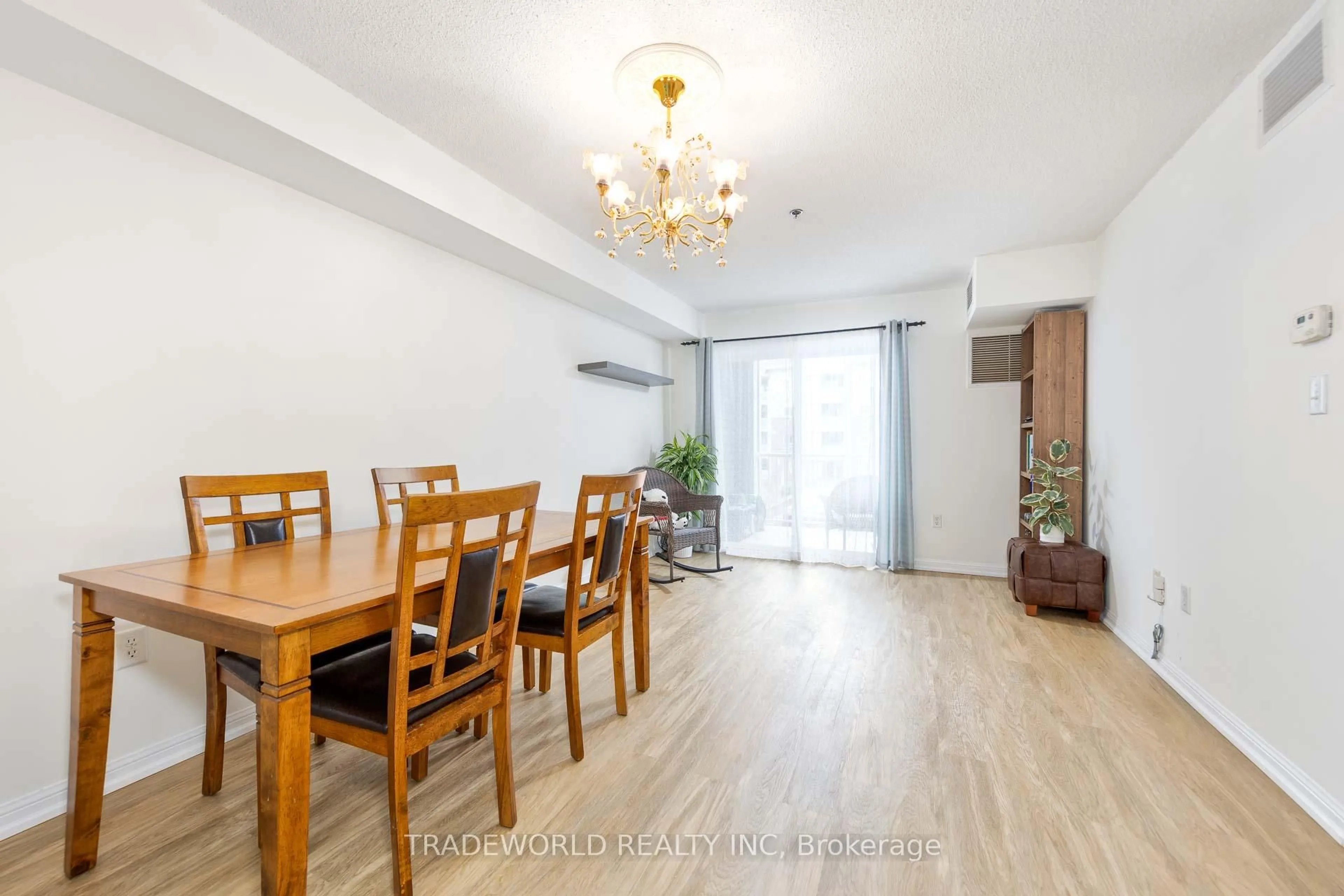 Dining room, wood/laminate floor for 5225 Finch Ave #201, Toronto Ontario M1S 5W8