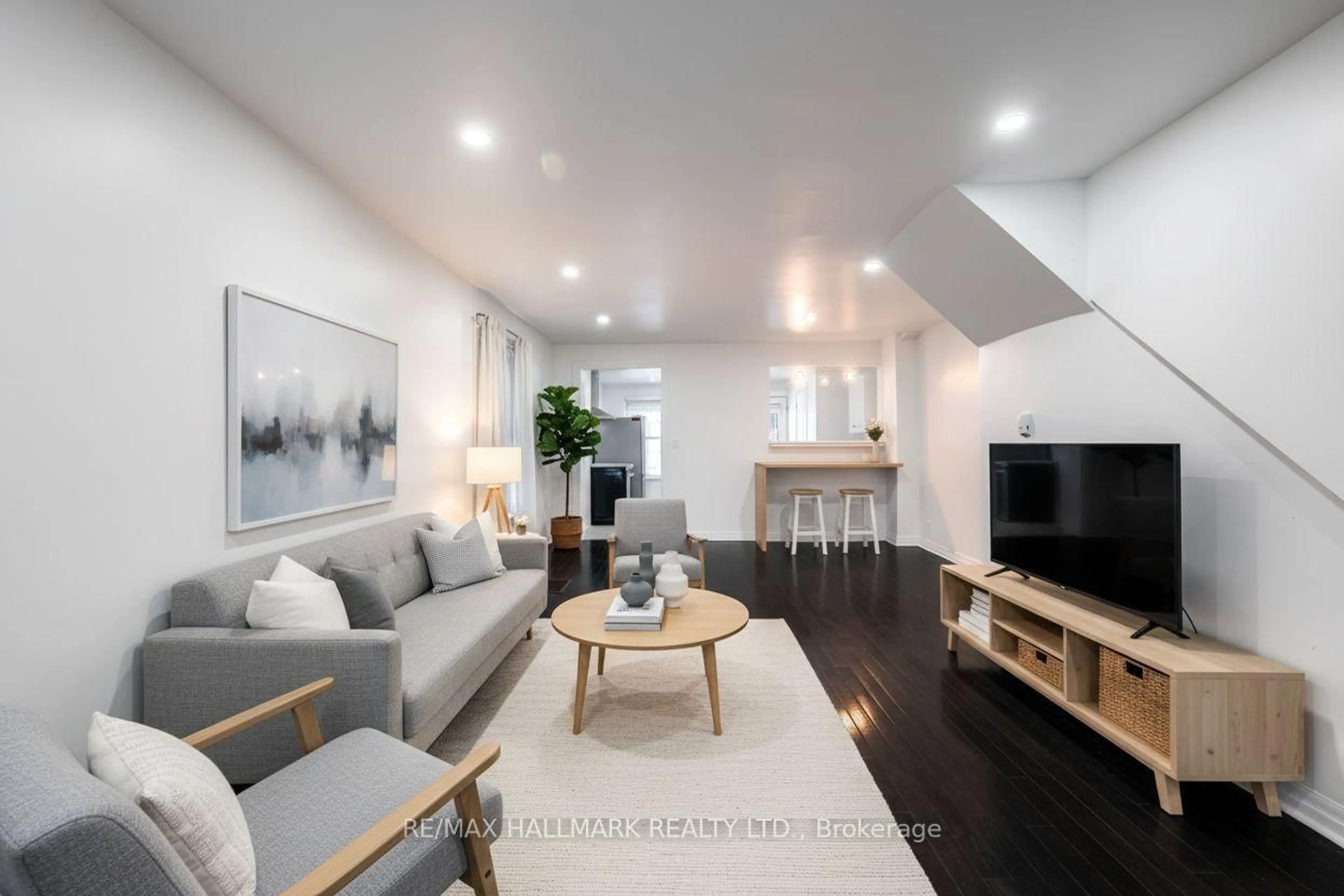 Living room with furniture, unknown for 106 Willow Ave, Toronto Ontario M4E 3K3