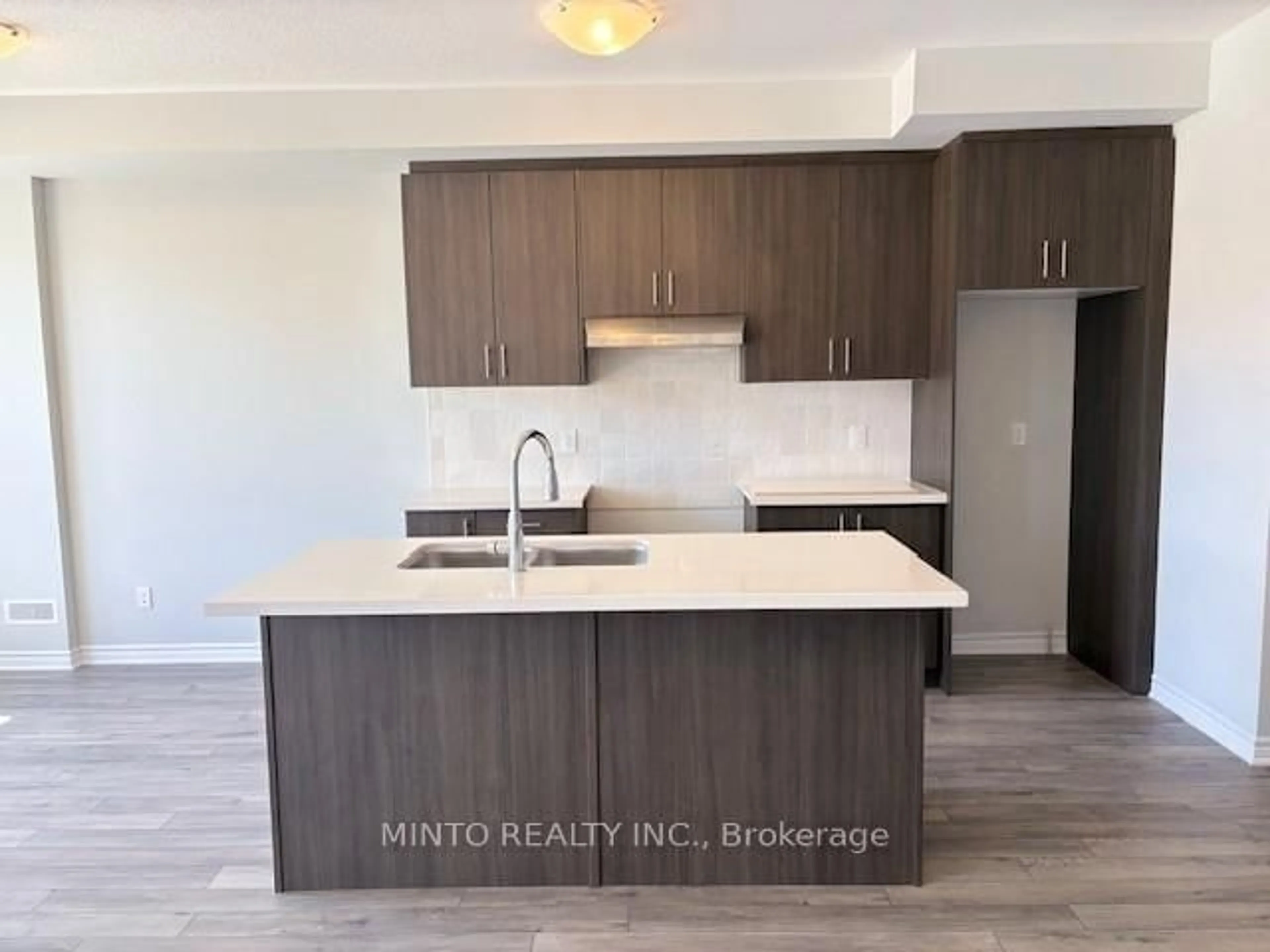 Open concept kitchen, wood/laminate floor for 1038 Porcupine Path, Oshawa Ontario L1L 0X1