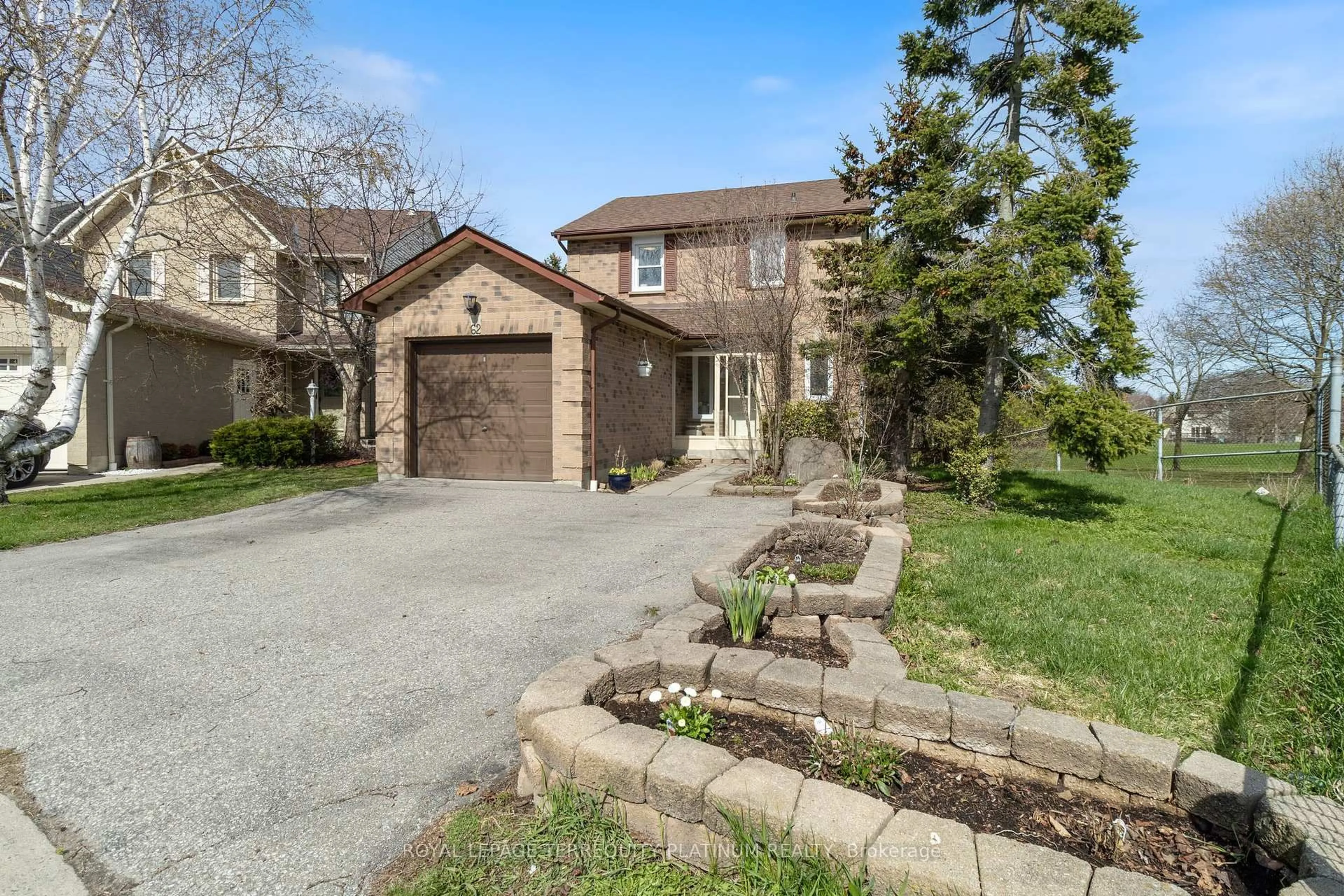 Home with brick exterior material, street for 62 Humphrey Dr, Ajax Ontario L1S 4Z2