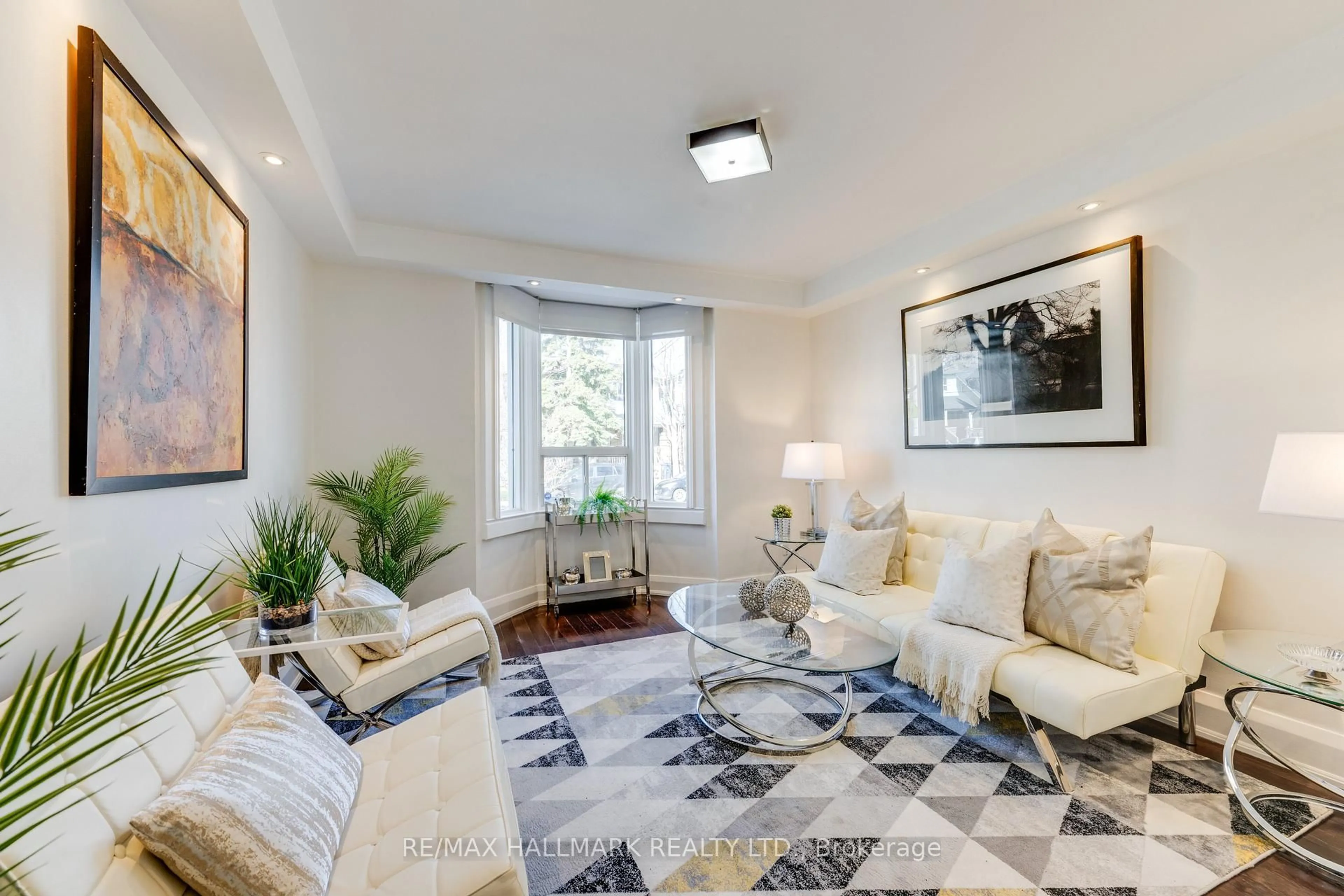 Living room with furniture, unknown for 129 Woodfield Rd, Toronto Ontario M4L 2W5