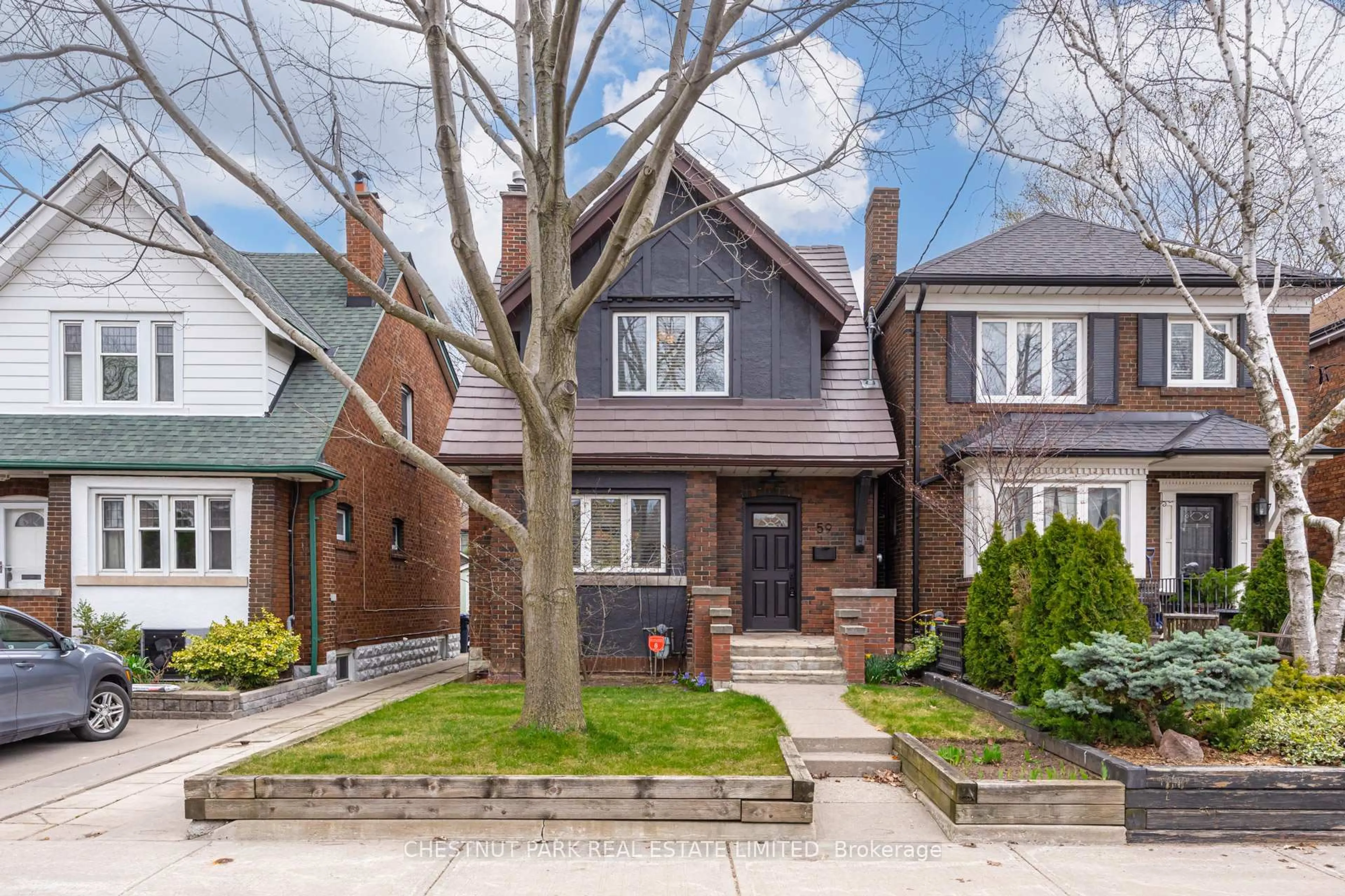 Home with brick exterior material, street for 59 Chilton Rd, Toronto Ontario M4J 3C7