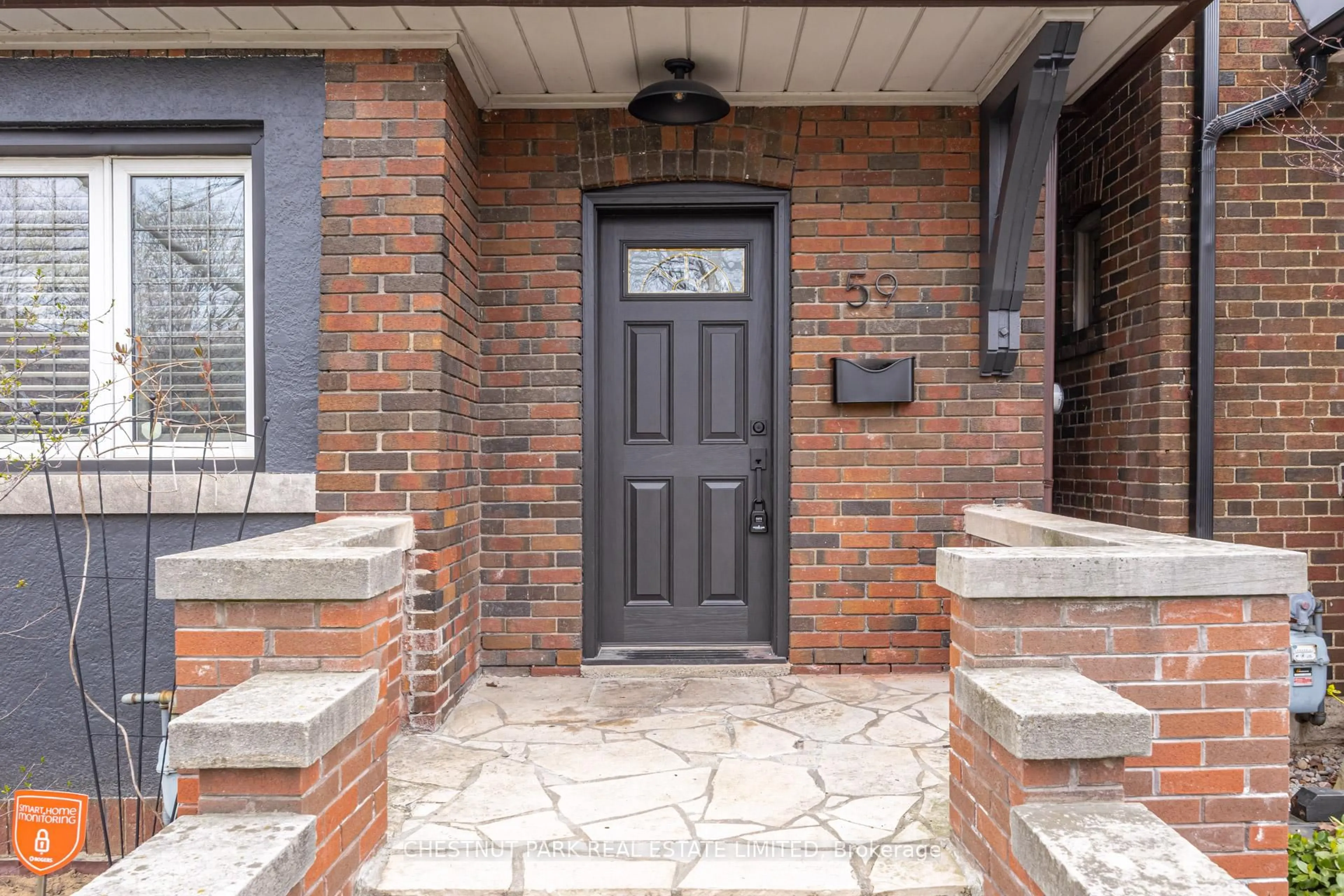 Home with brick exterior material, street for 59 Chilton Rd, Toronto Ontario M4J 3C7
