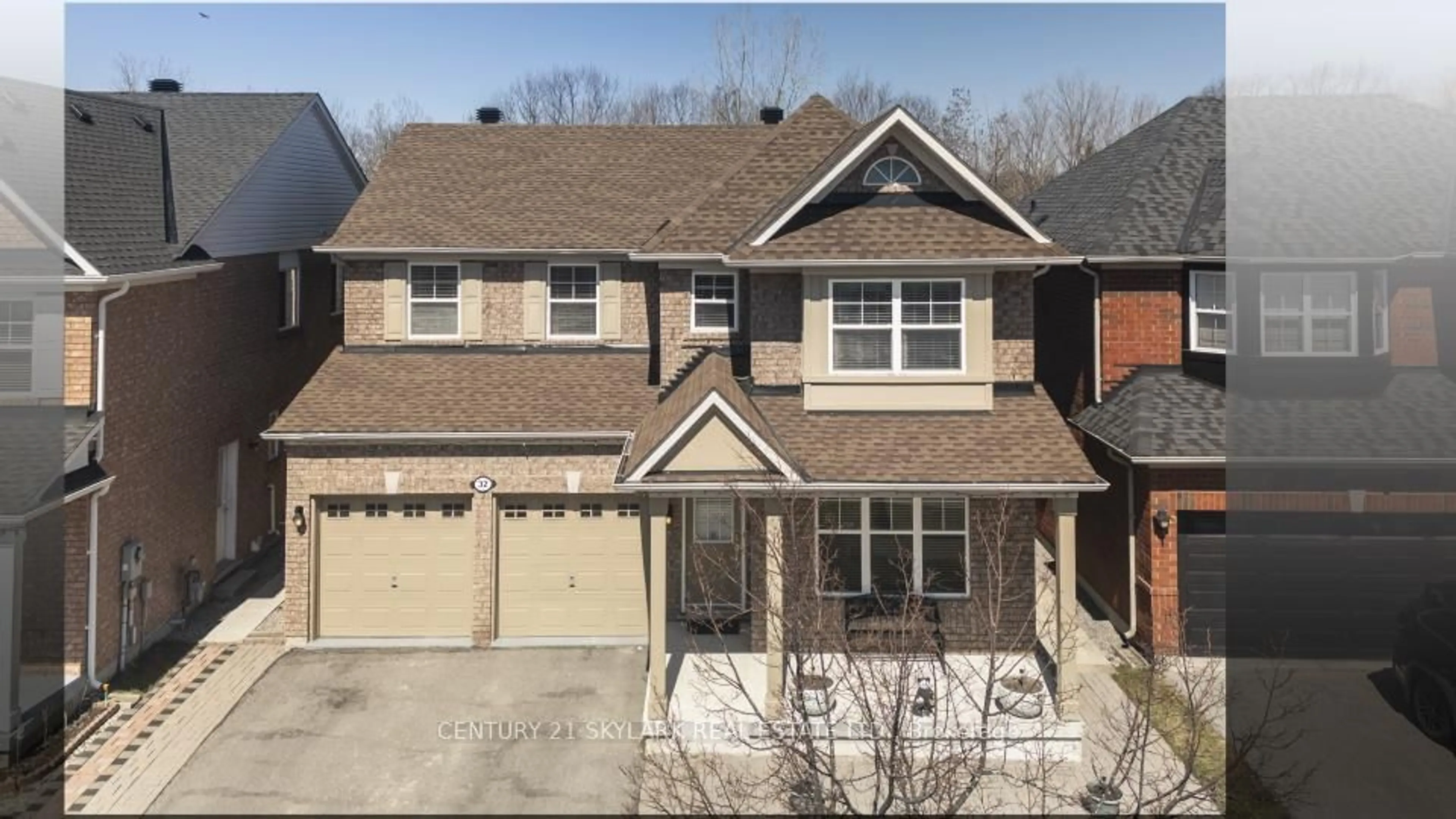 Home with brick exterior material, street for 32 Meandering Tr, Toronto Ontario M1B 6E8