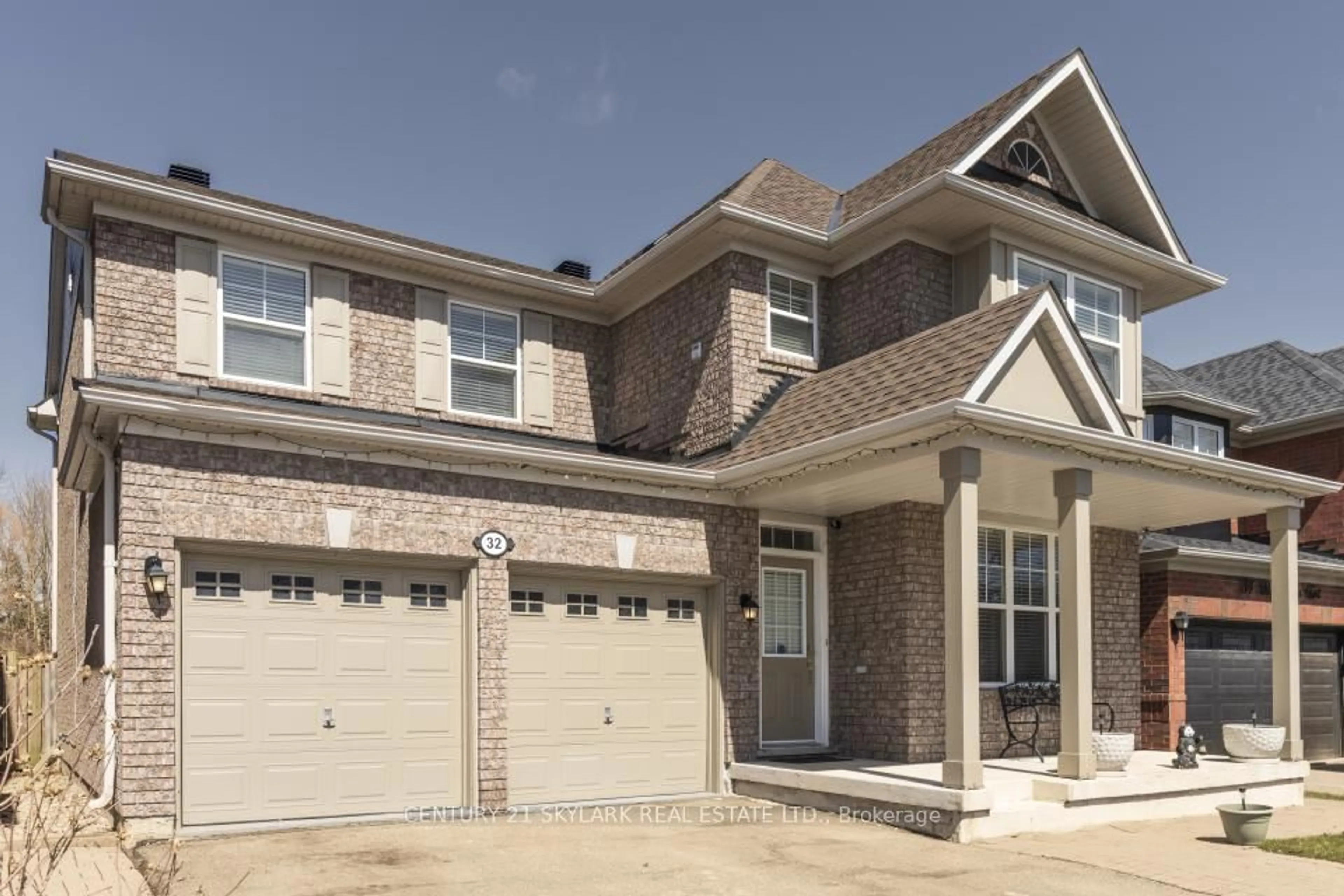 Home with brick exterior material, street for 32 Meandering Tr, Toronto Ontario M1B 6E8