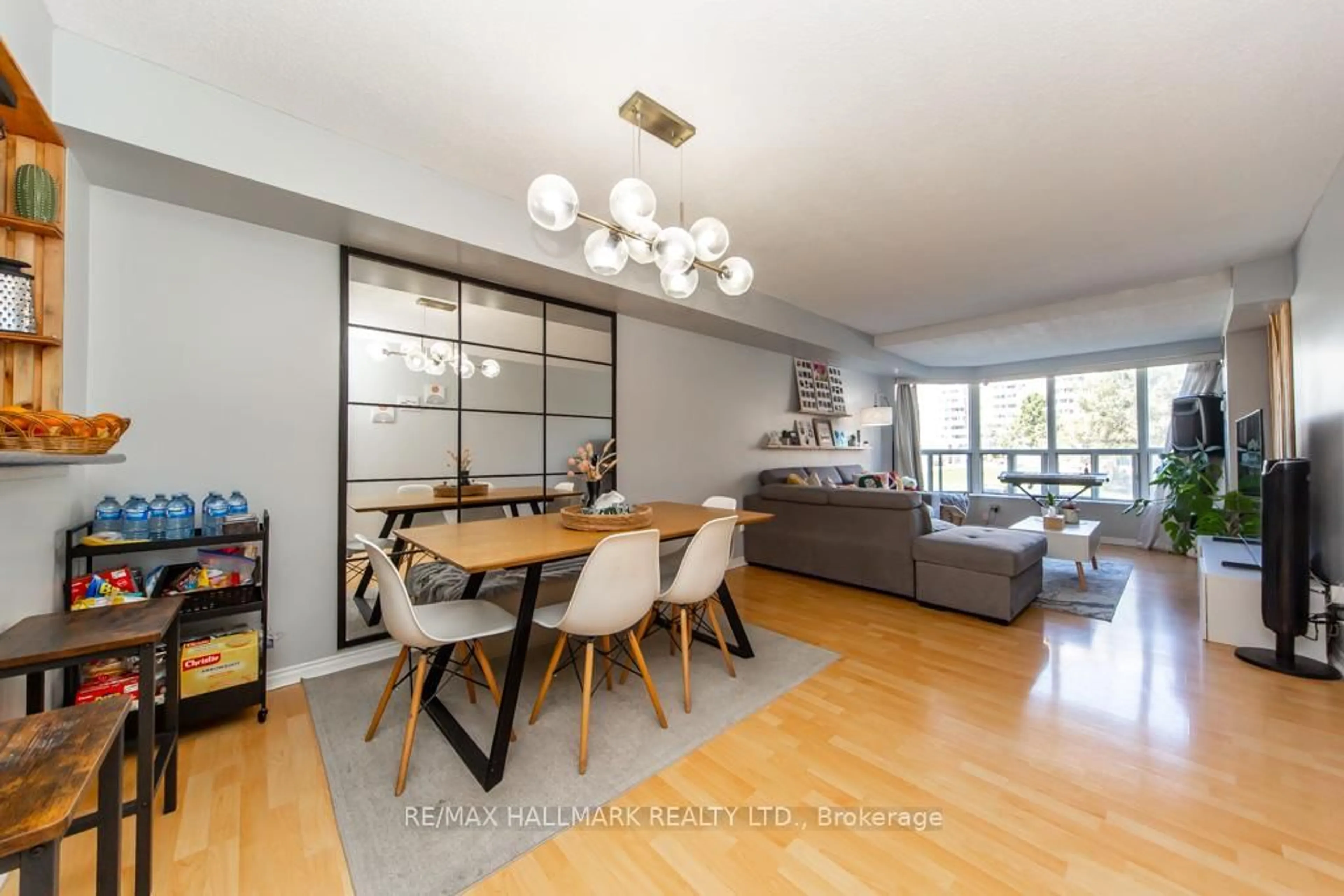 Dining room, wood/laminate floor for 410 McLevin Ave #207, Toronto Ontario M1B 5J5