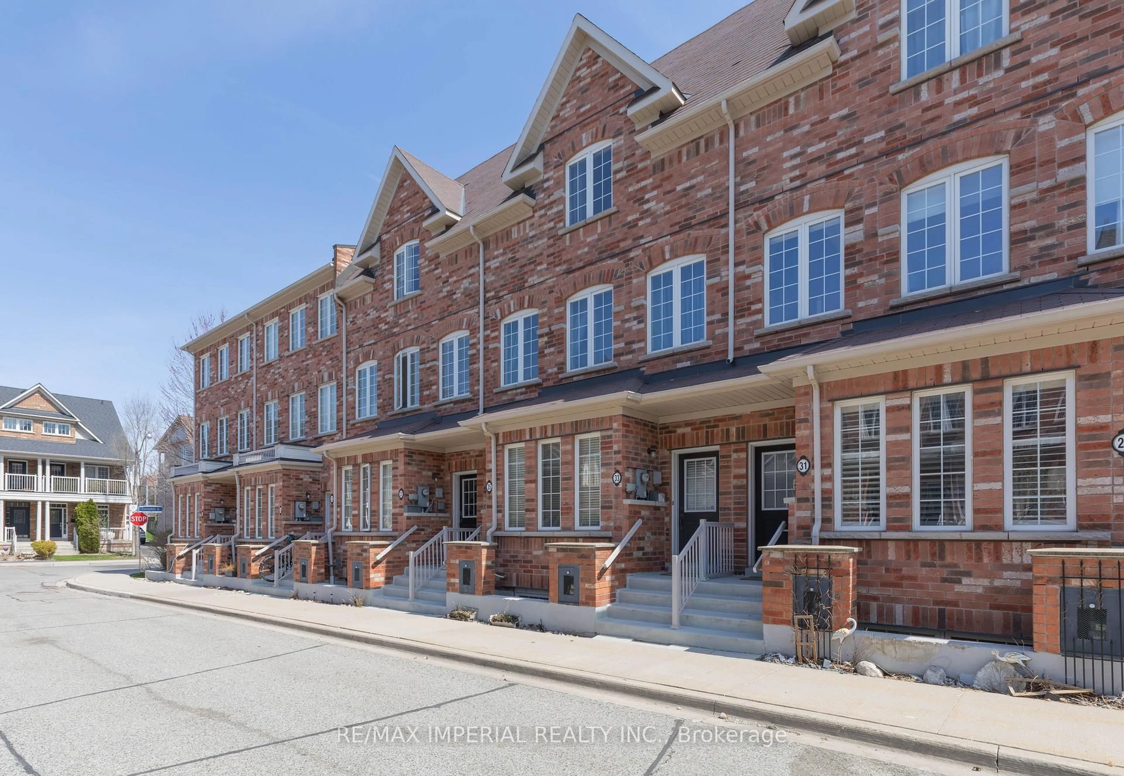 Home with brick exterior material, street for 37 Carnahan Terr, Toronto Ontario M4E 0B2