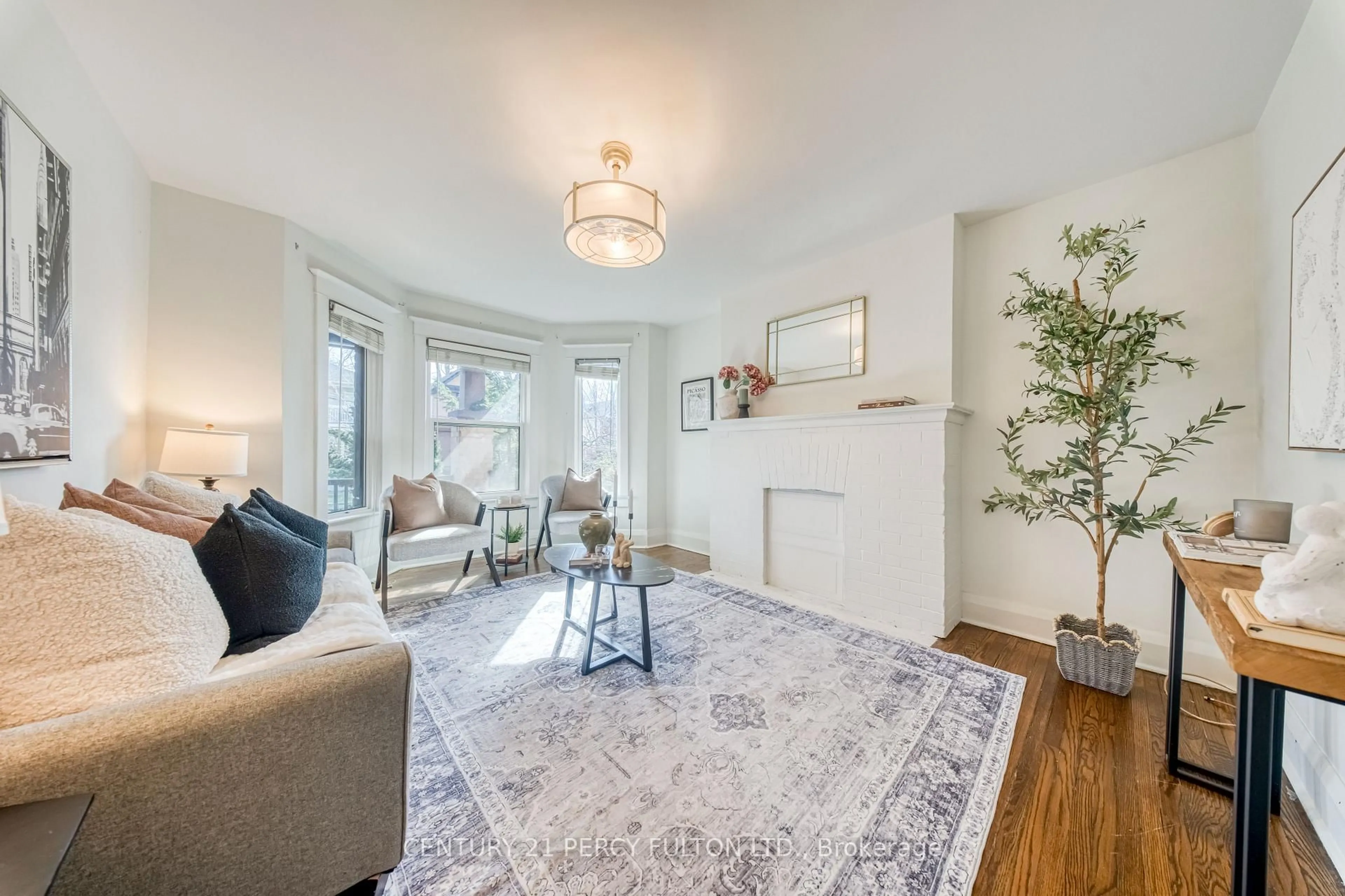 Living room with furniture, unknown for 10 Redwood Ave, Toronto Ontario M4L 2S6