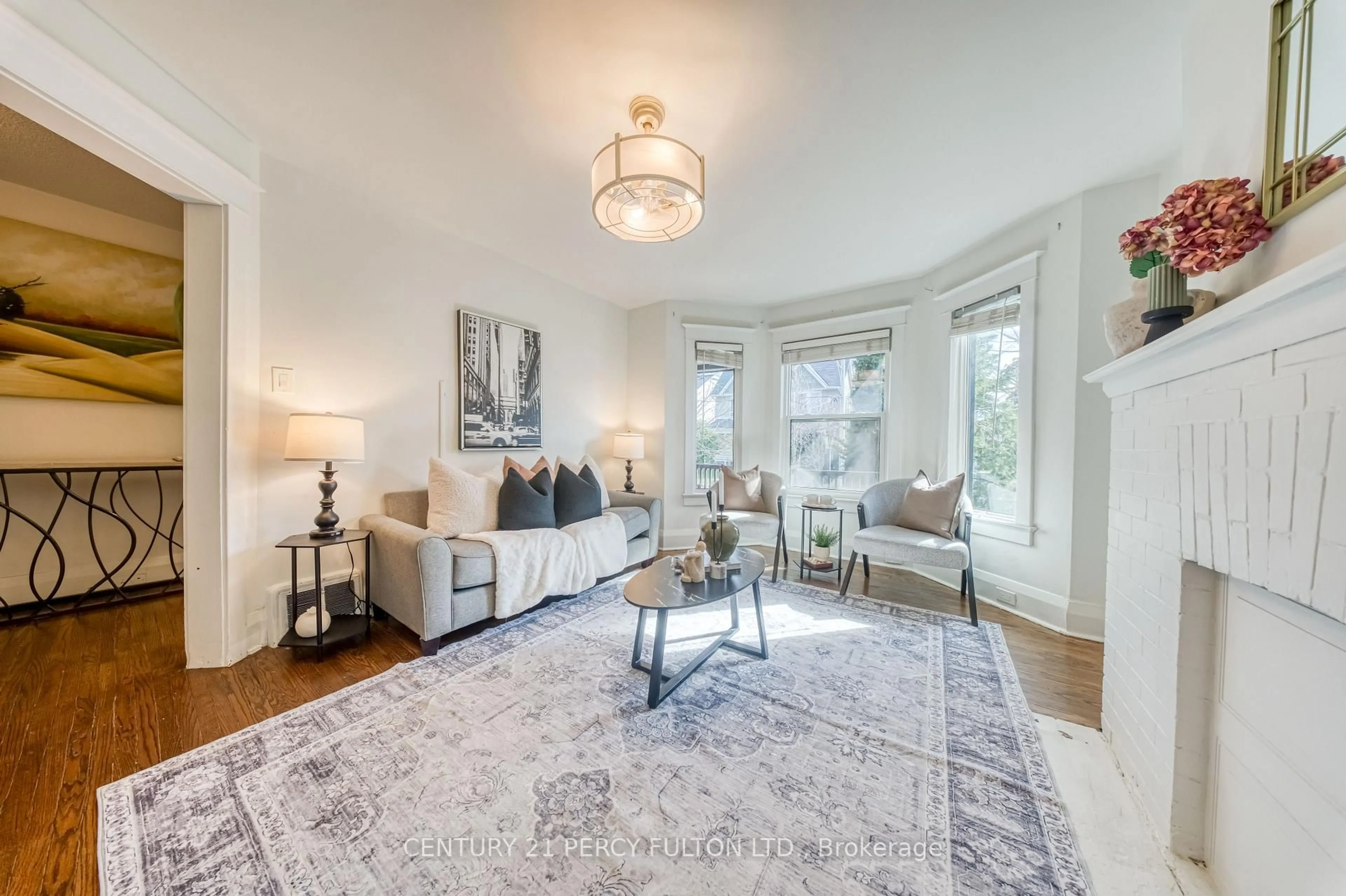 Living room with furniture, unknown for 10 Redwood Ave, Toronto Ontario M4L 2S6