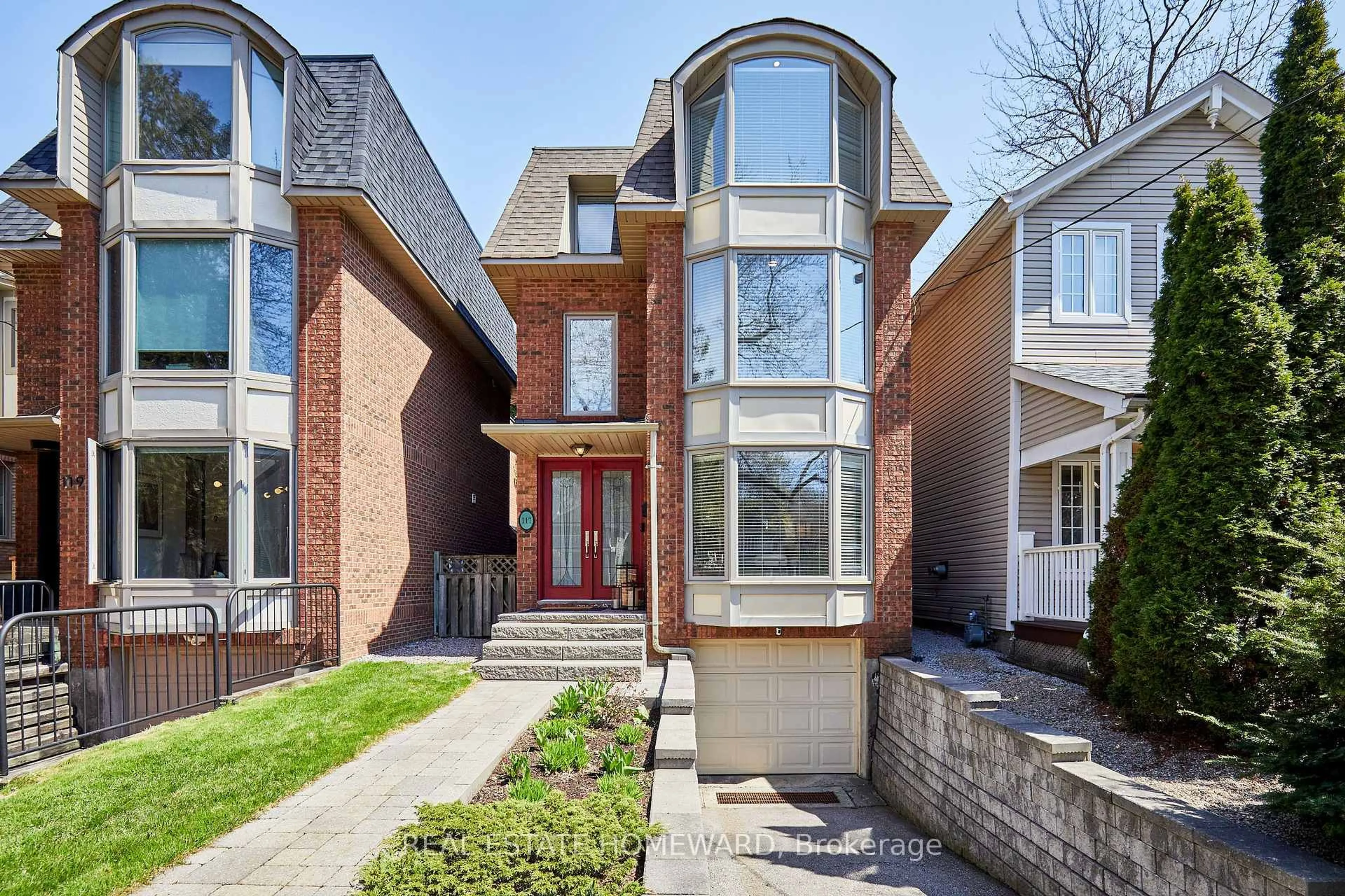 Home with brick exterior material, street for 117 Edgewood Ave, Toronto Ontario M4L 3H2