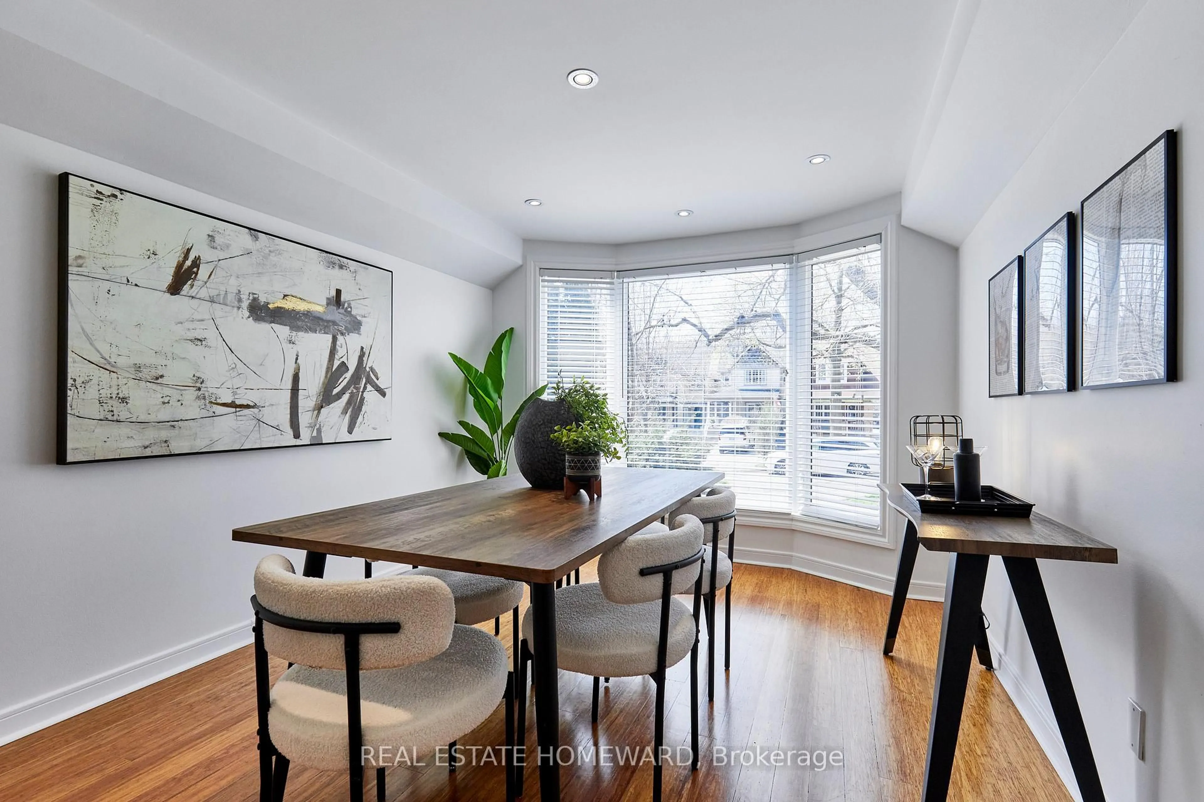 Dining room, wood/laminate floor for 117 Edgewood Ave, Toronto Ontario M4L 3H2