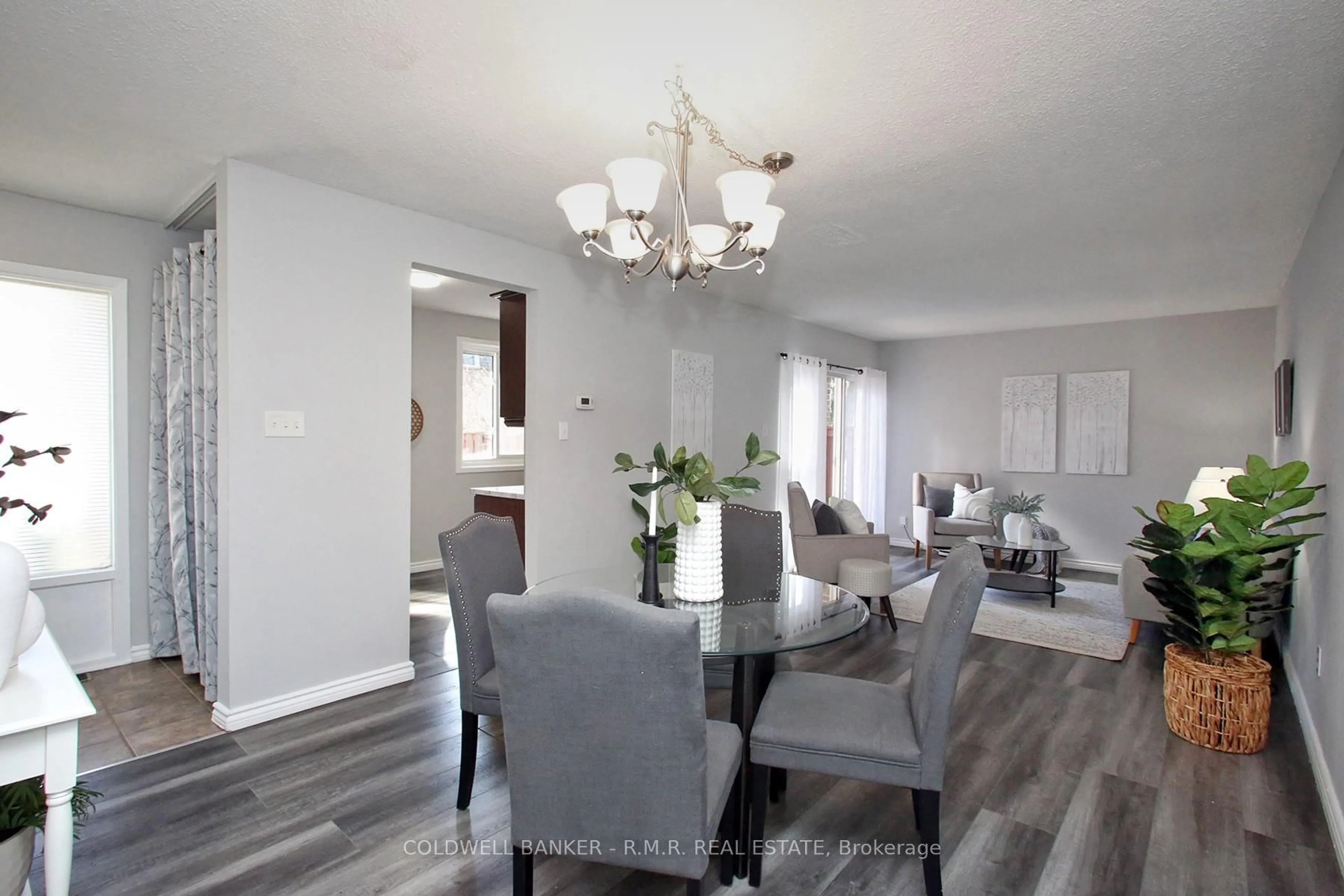 Dining room, wood/laminate floor for 109 Dovedale Dr #48, Whitby Ontario L1N 1Z7