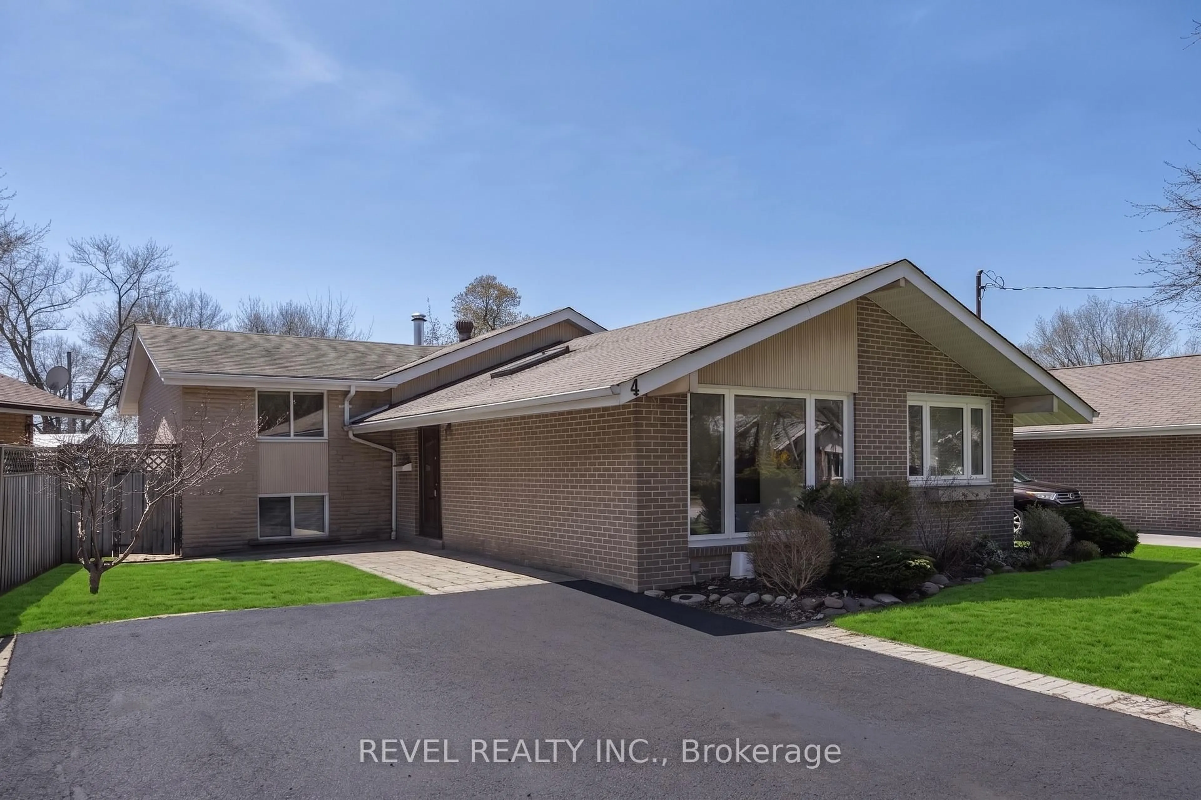 Home with brick exterior material, street for 4 Oakley Blvd, Toronto Ontario M1P 3P2