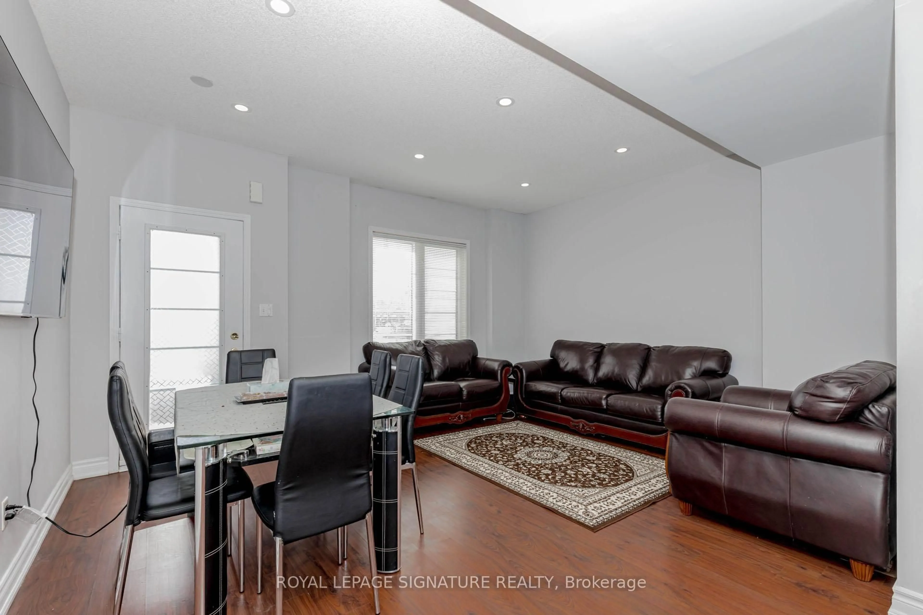 Living room with furniture, wood/laminate floor for 130 Bayly St, Ajax Ontario L1S 0C3