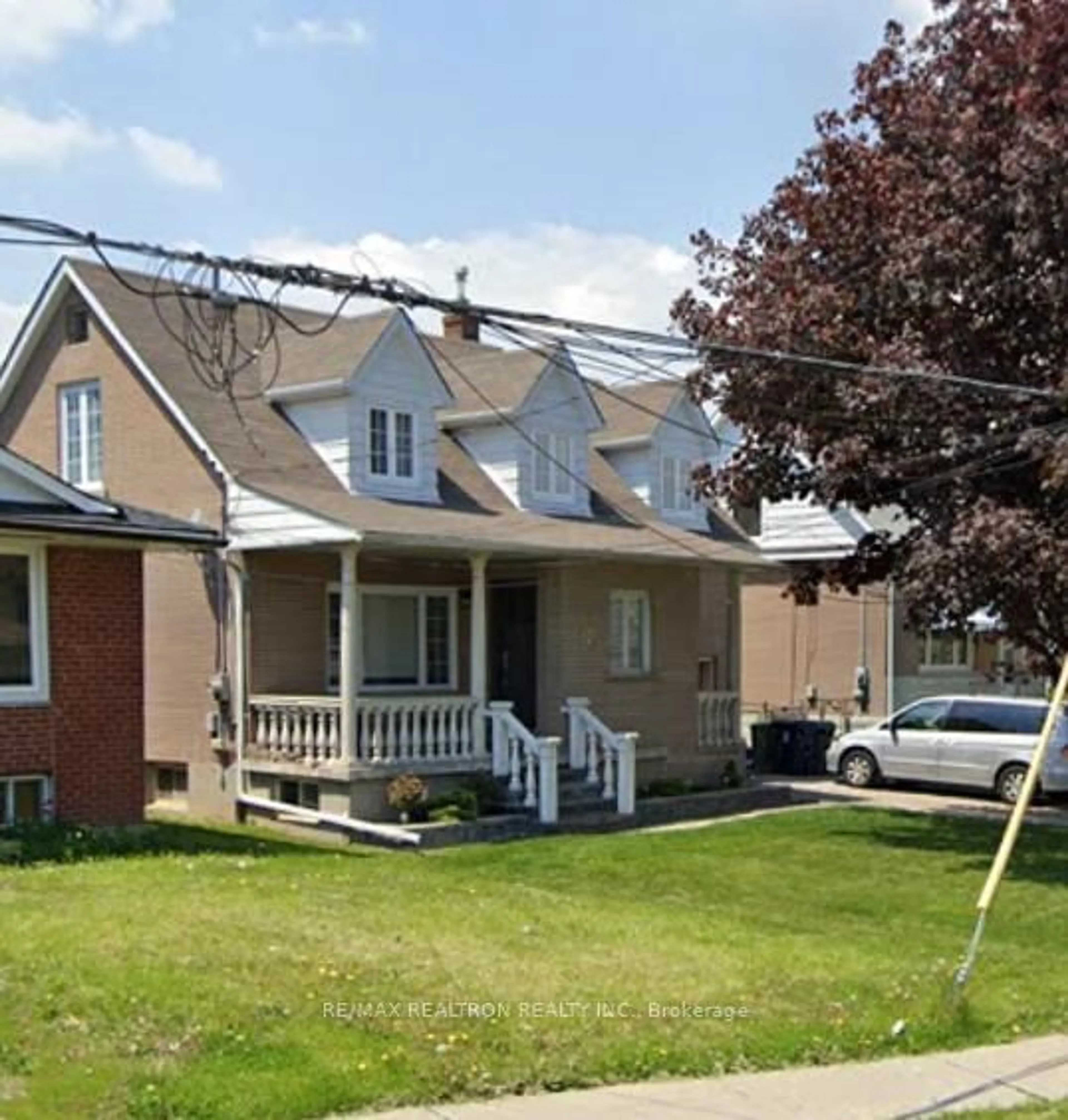 Home with vinyl exterior material, street for 12 Gooderham Dr, Toronto Ontario M1R 3G5