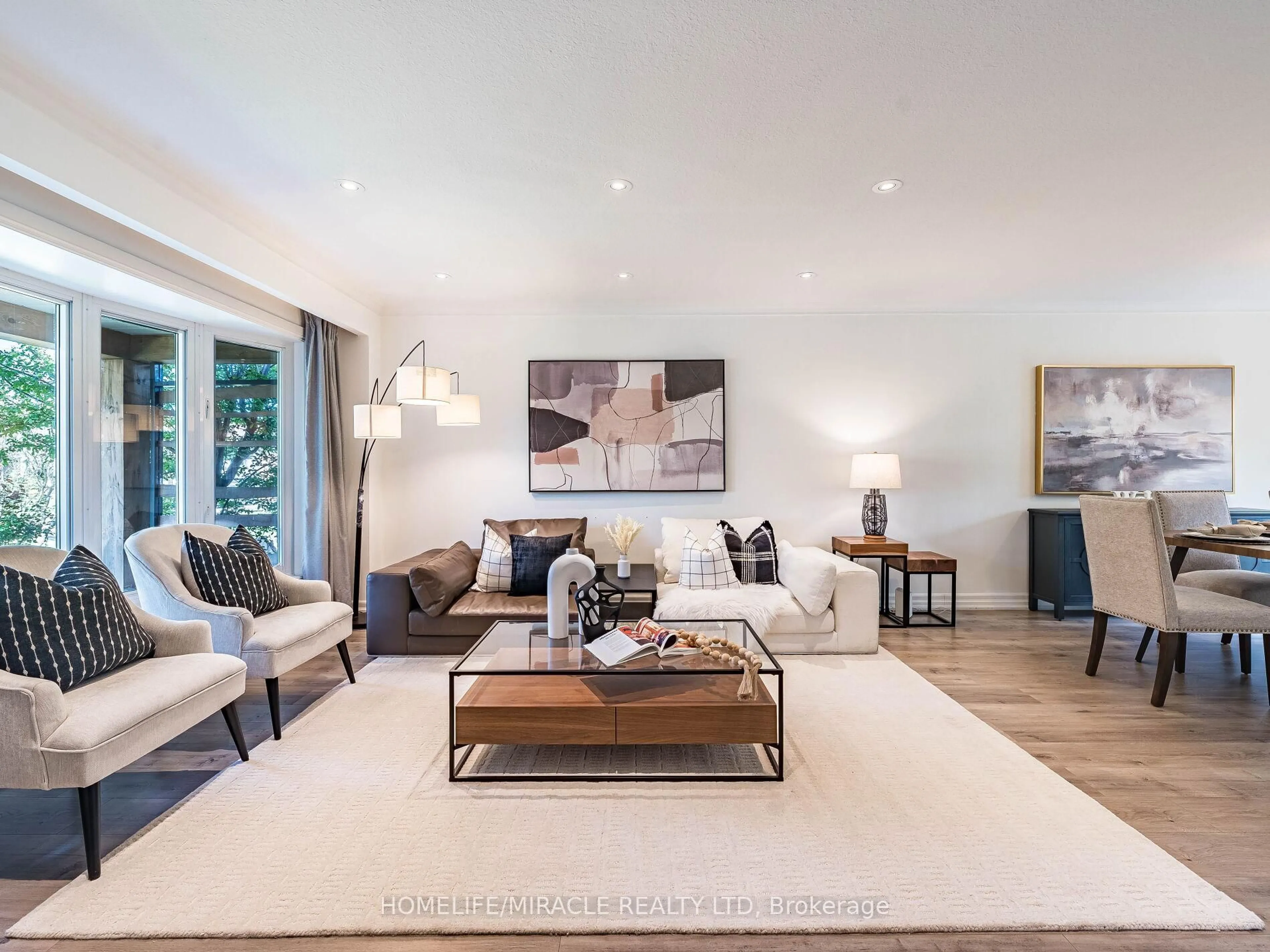 Living room with furniture, wood/laminate floor for 7 Chapais Cres, Toronto Ontario M1C 2C3