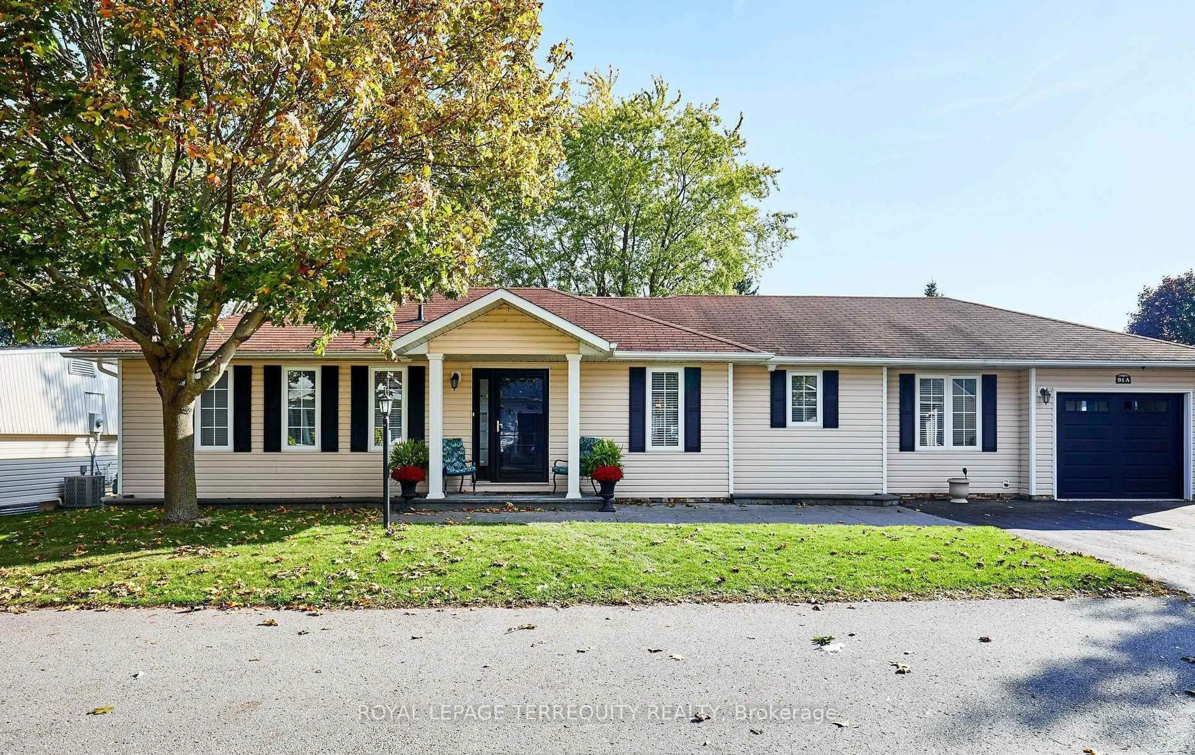 Home with vinyl exterior material, street for 91A Wilmot Tr, Clarington Ontario L1B 1B8