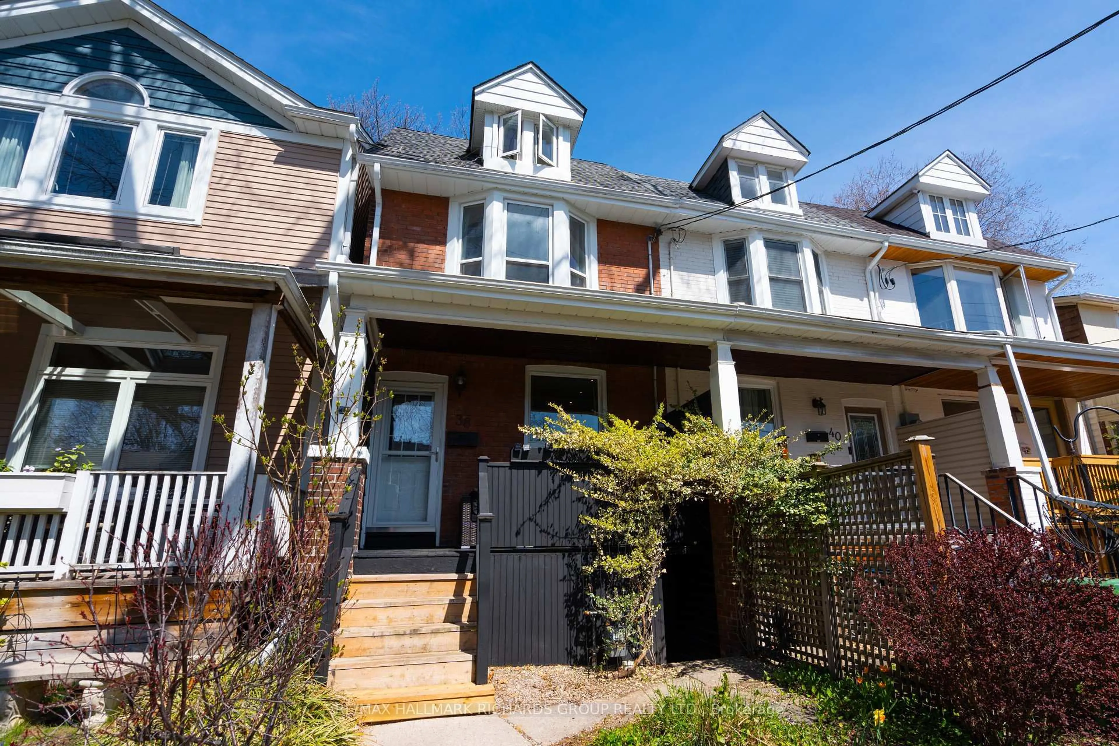 Home with brick exterior material, street for 38 Burgess Ave, Toronto Ontario M4E 1W7