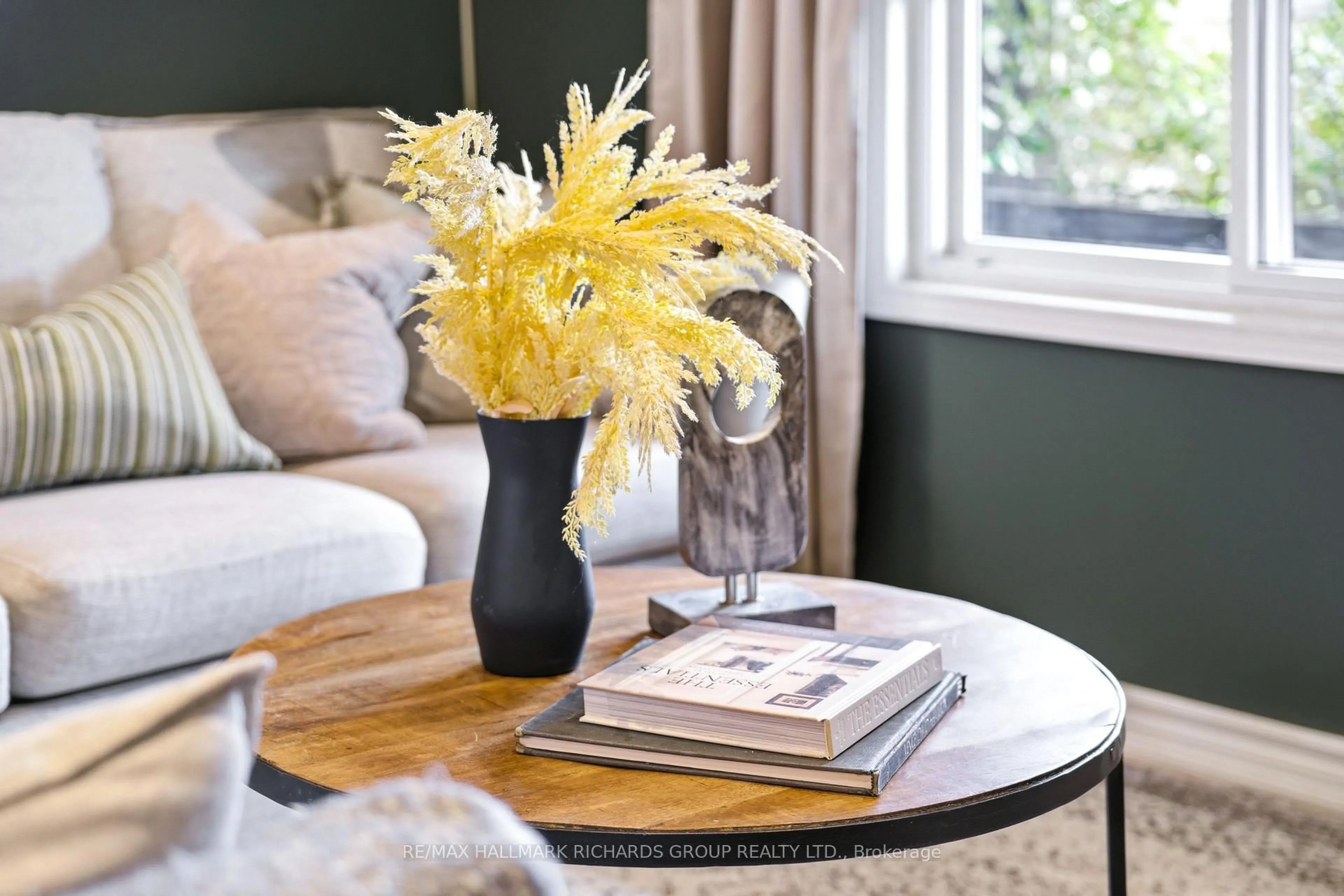 Living room with furniture, wood/laminate floor for 38 Burgess Ave, Toronto Ontario M4E 1W7