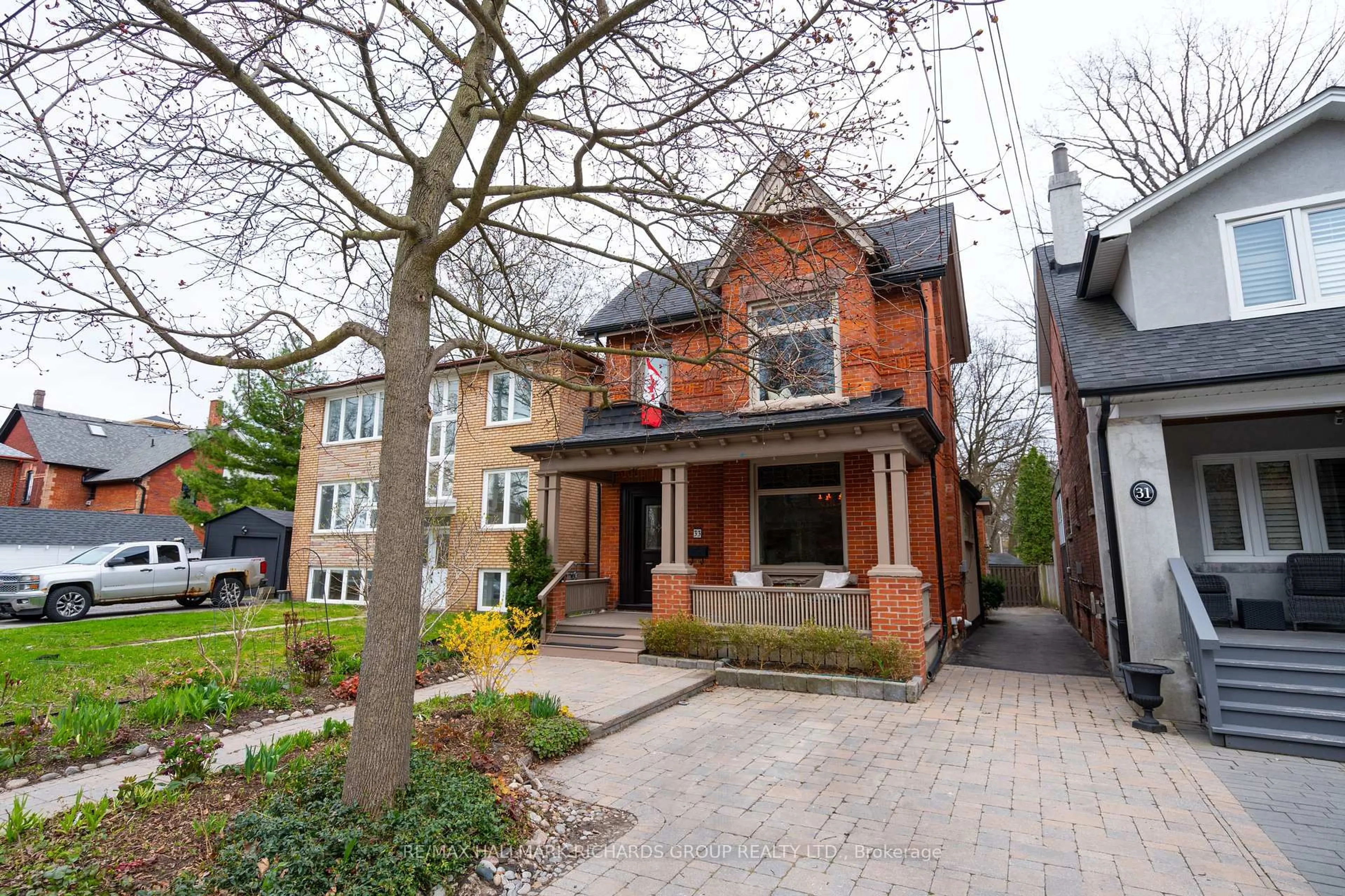 Home with brick exterior material, street for 33 Swanwick Ave, Toronto Ontario M4E 1Z2
