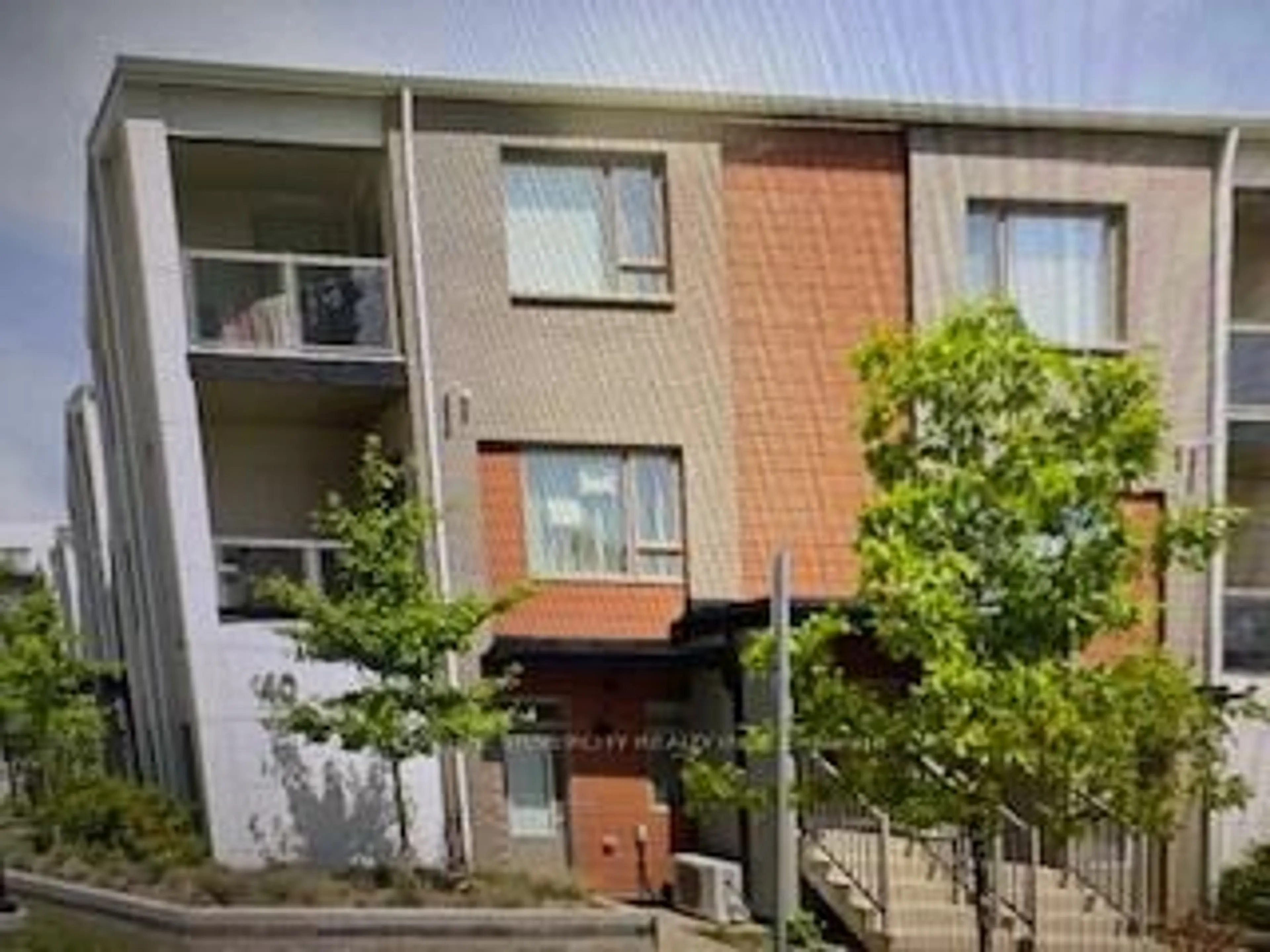 A pic from outside/outdoor area/front of a property/back of a property/a pic from drone, street for 40 Orchid Place Dr #26, Toronto Ontario M1B 0C4
