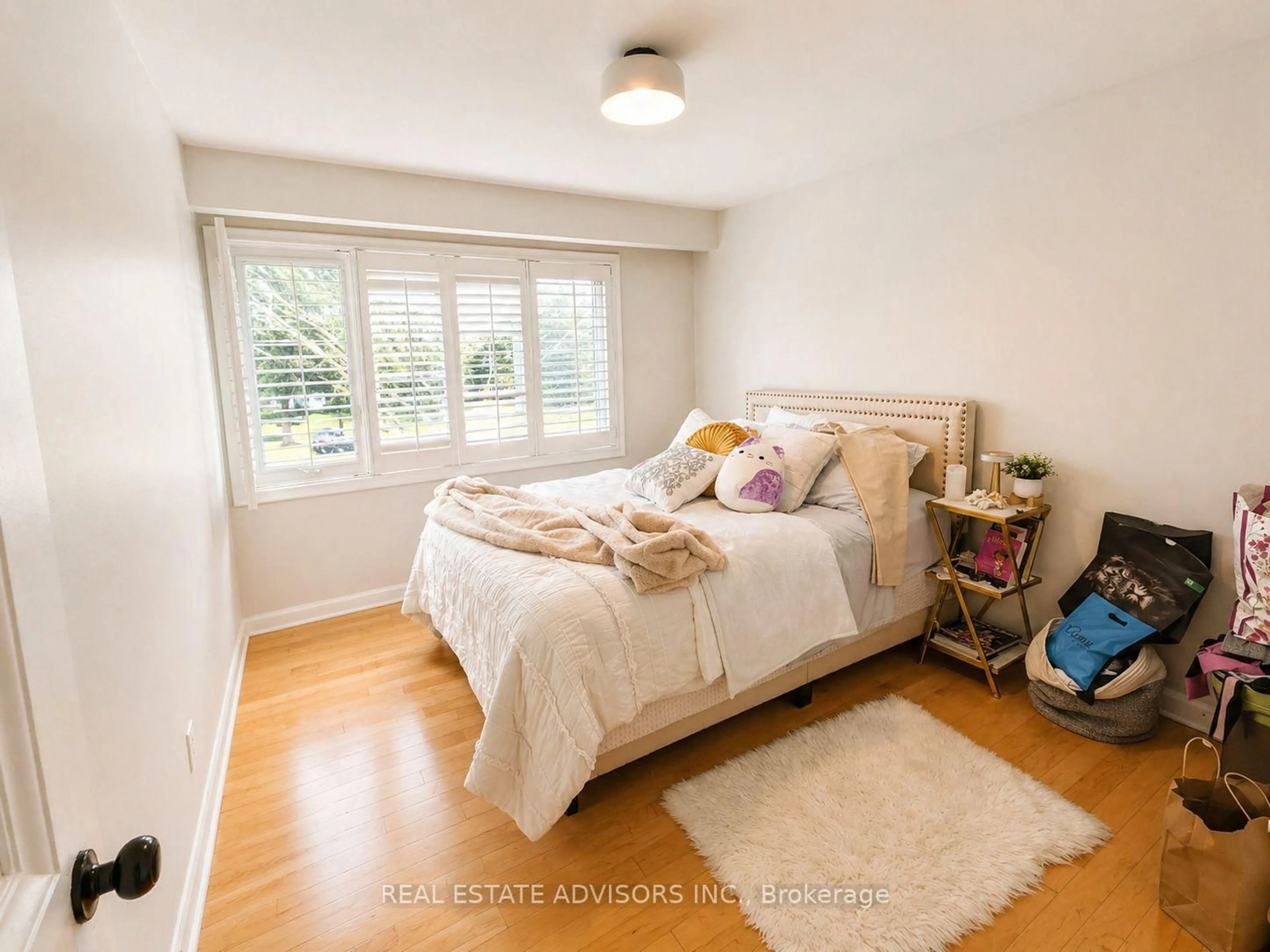 Bedroom with bed, wood/laminate floor for 1 Lakehill Cres, Toronto Ontario M1M 1E5