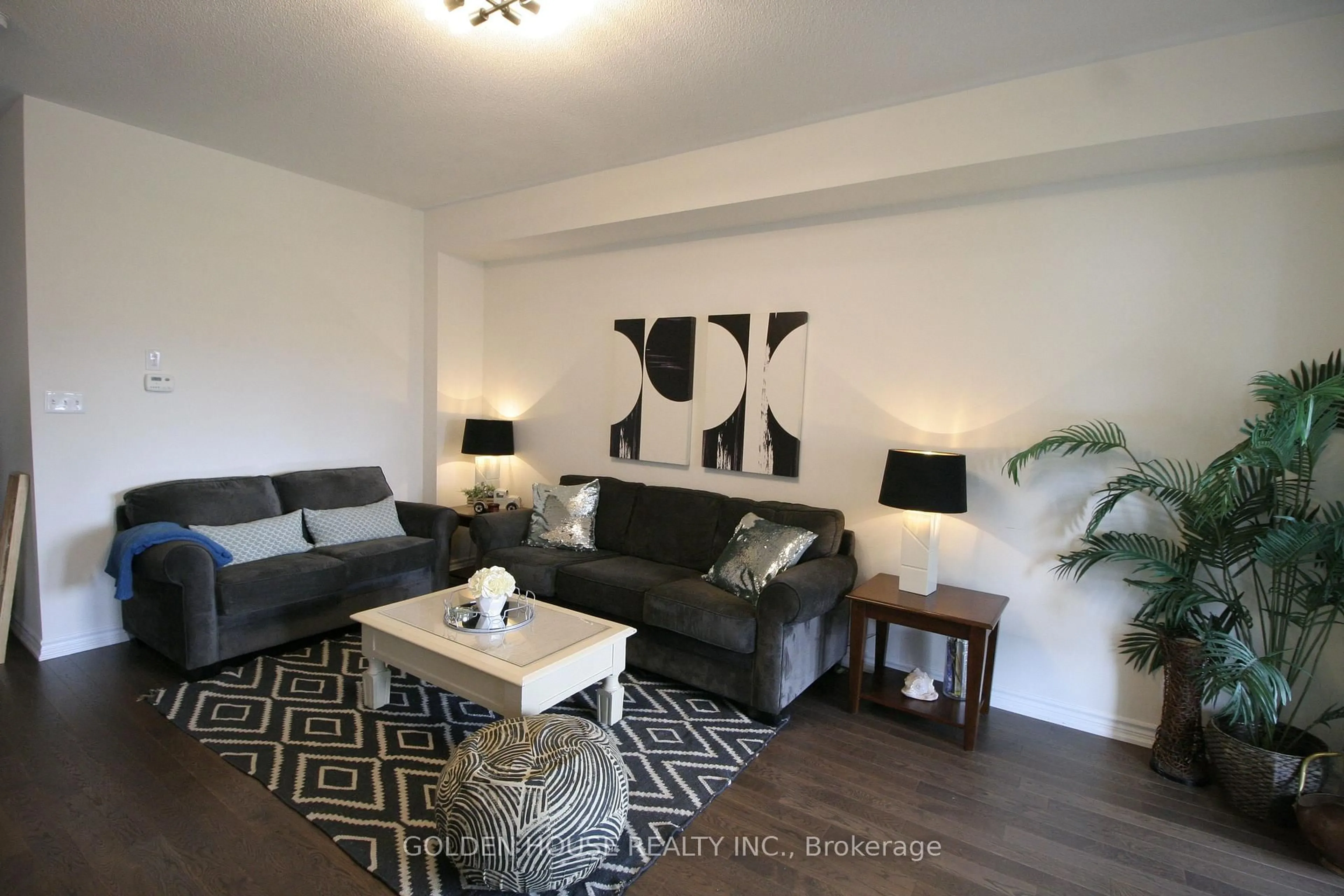 Living room with furniture, wood/laminate floor for 2540 William Jackson Dr #402, Pickering Ontario L1X 0E4